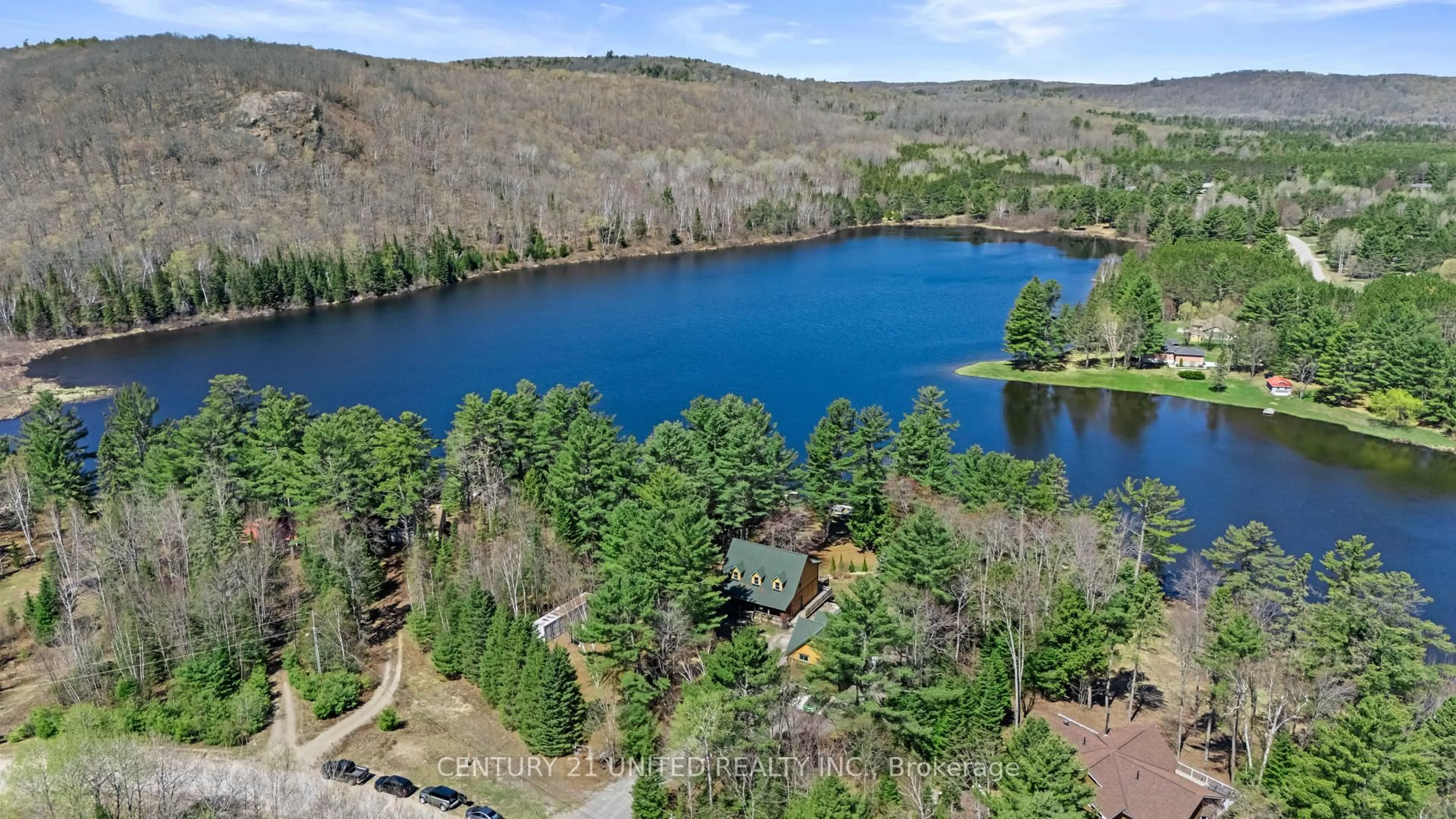 A pic from outside/outdoor area/front of a property/back of a property/a pic from drone, water/lake/river/ocean view for 28 Van Luven Lane, Bancroft Ontario K0L 1C0
