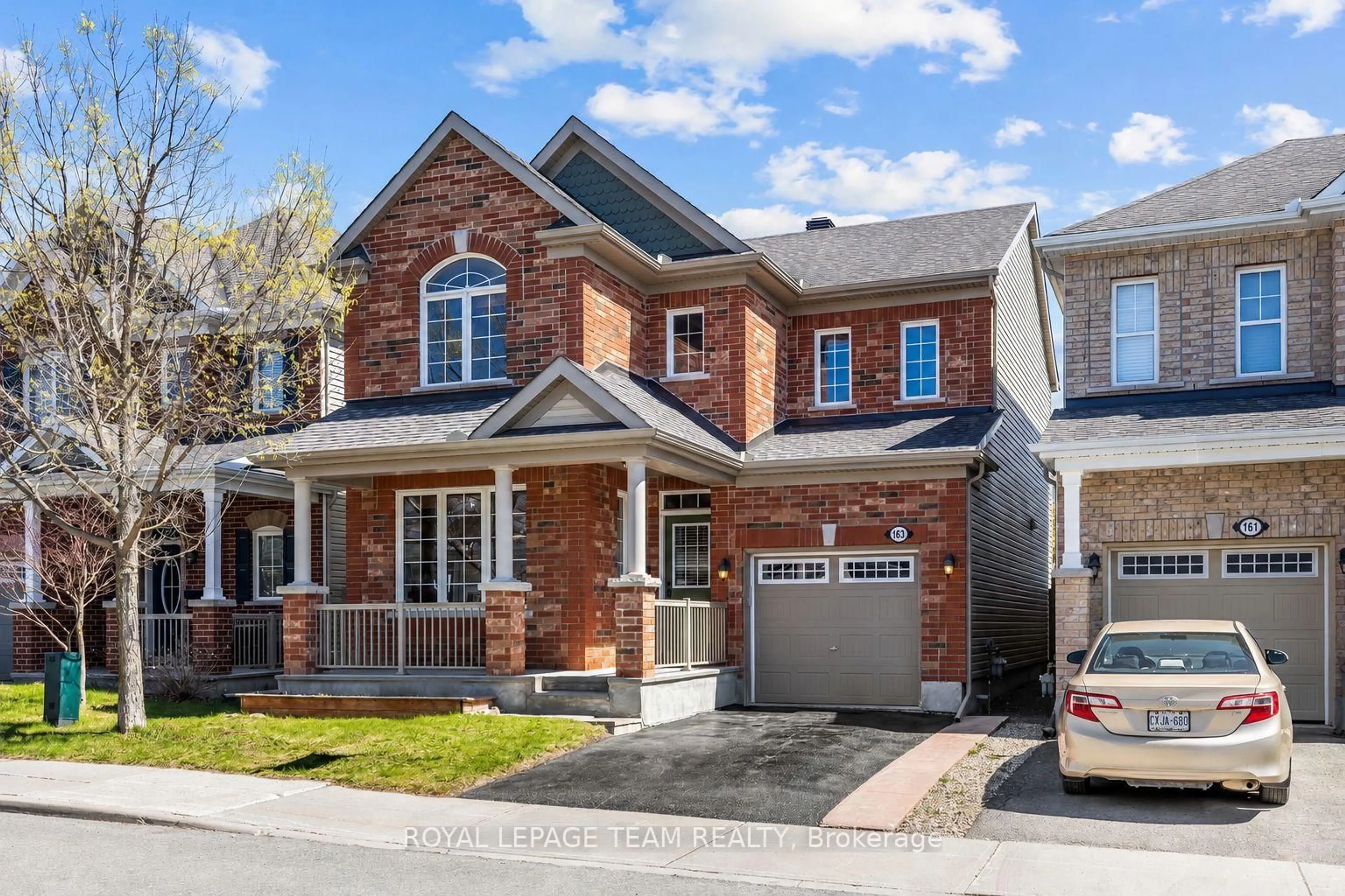 Home with brick exterior material, street for 163 Lily Pond St, Ottawa Ontario K2M 0J5