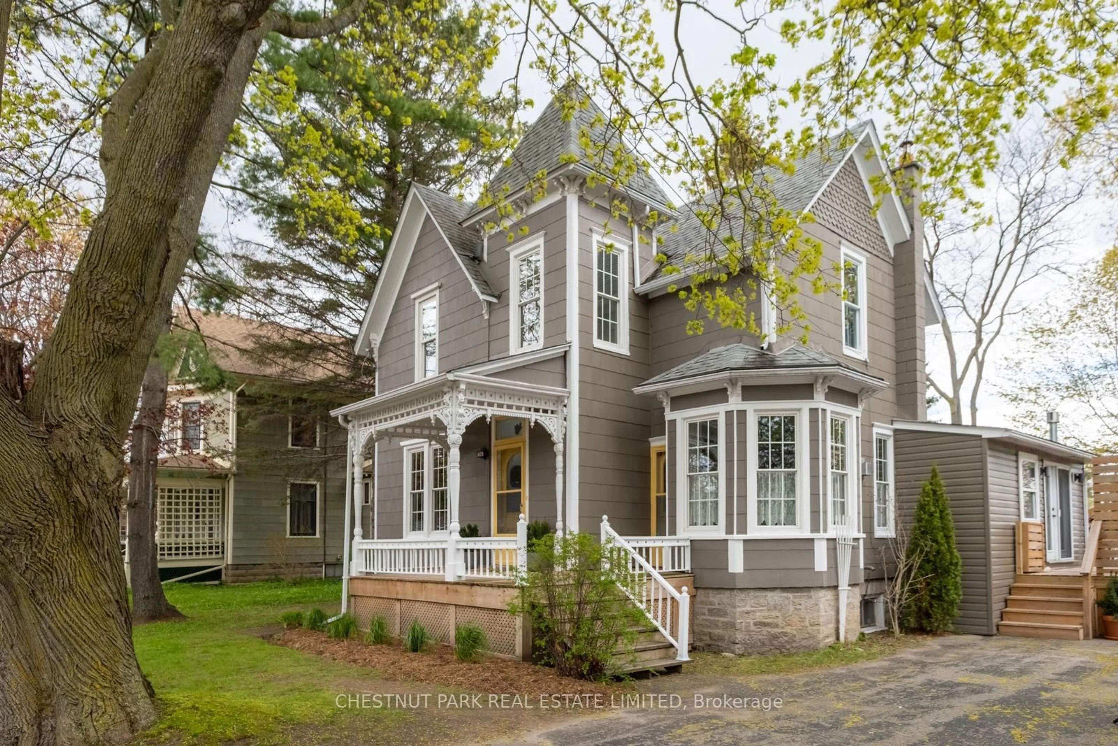 Home with vinyl exterior material, street for 16 Johnson St, Prince Edward County Ontario K0K 2T0