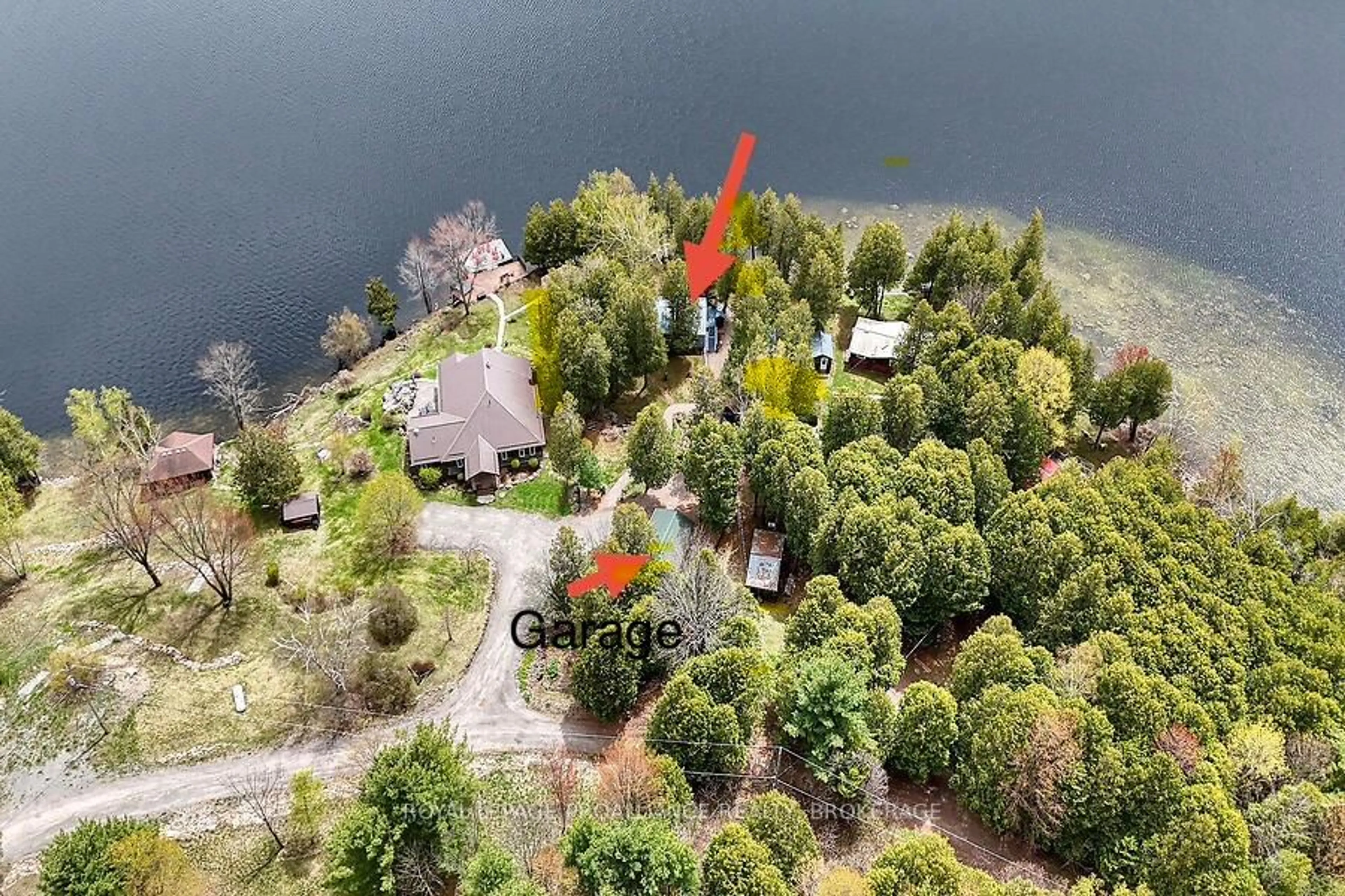 A pic from outside/outdoor area/front of a property/back of a property/a pic from drone, water/lake/river/ocean view for 173 Space Lane, Godfrey Ontario K0H 1T0