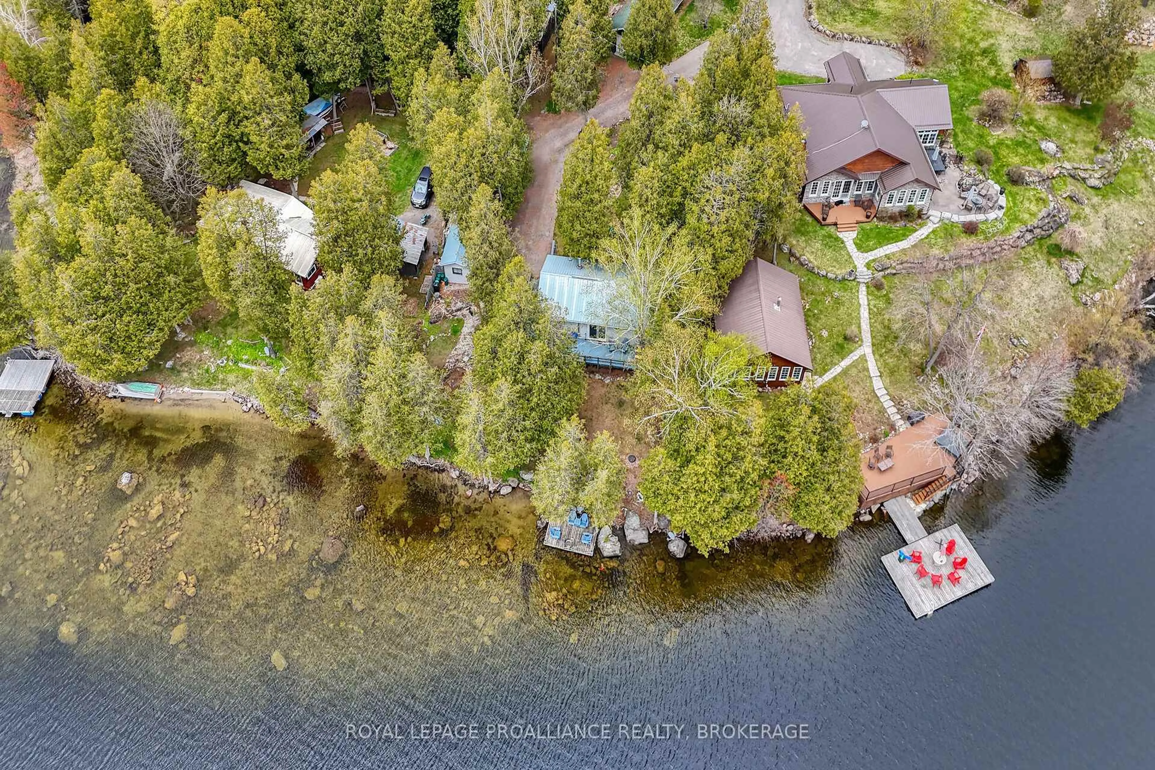 A pic from outside/outdoor area/front of a property/back of a property/a pic from drone, water/lake/river/ocean view for 173 Space Lane, Godfrey Ontario K0H 1T0