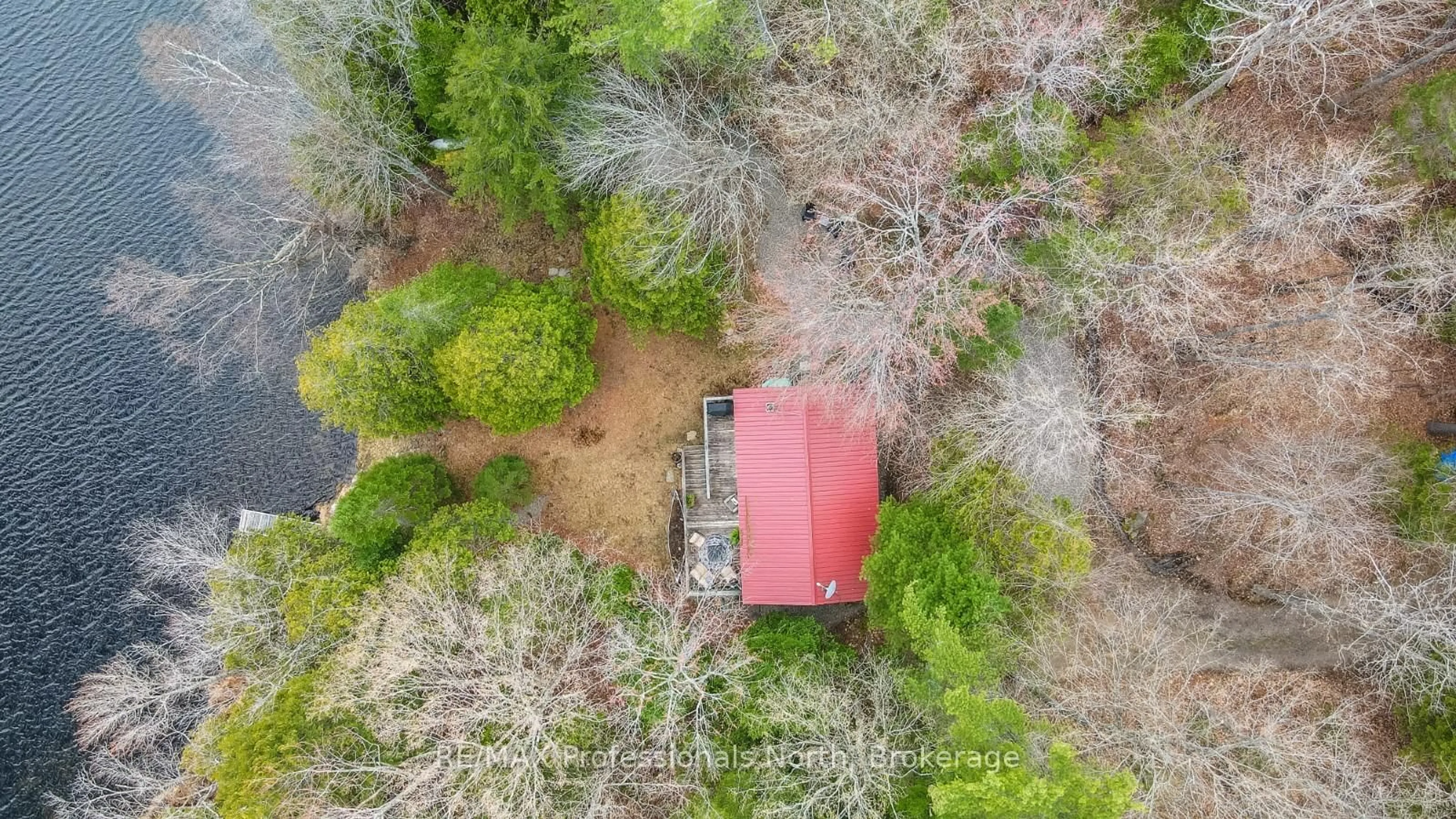 A pic from outside/outdoor area/front of a property/back of a property/a pic from drone, forest/trees view for 1107 PLUTO Tr, Dysart et al Ontario K0M 1S0