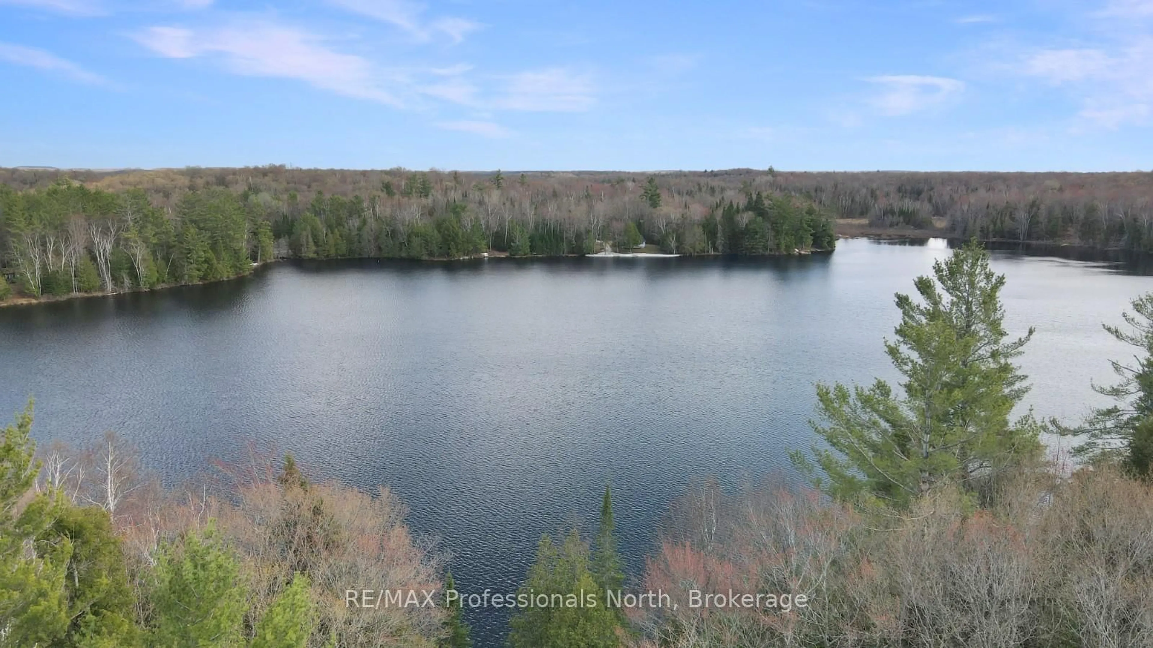 A pic from outside/outdoor area/front of a property/back of a property/a pic from drone, water/lake/river/ocean view for 1107 PLUTO Tr, Dysart et al Ontario K0M 1S0
