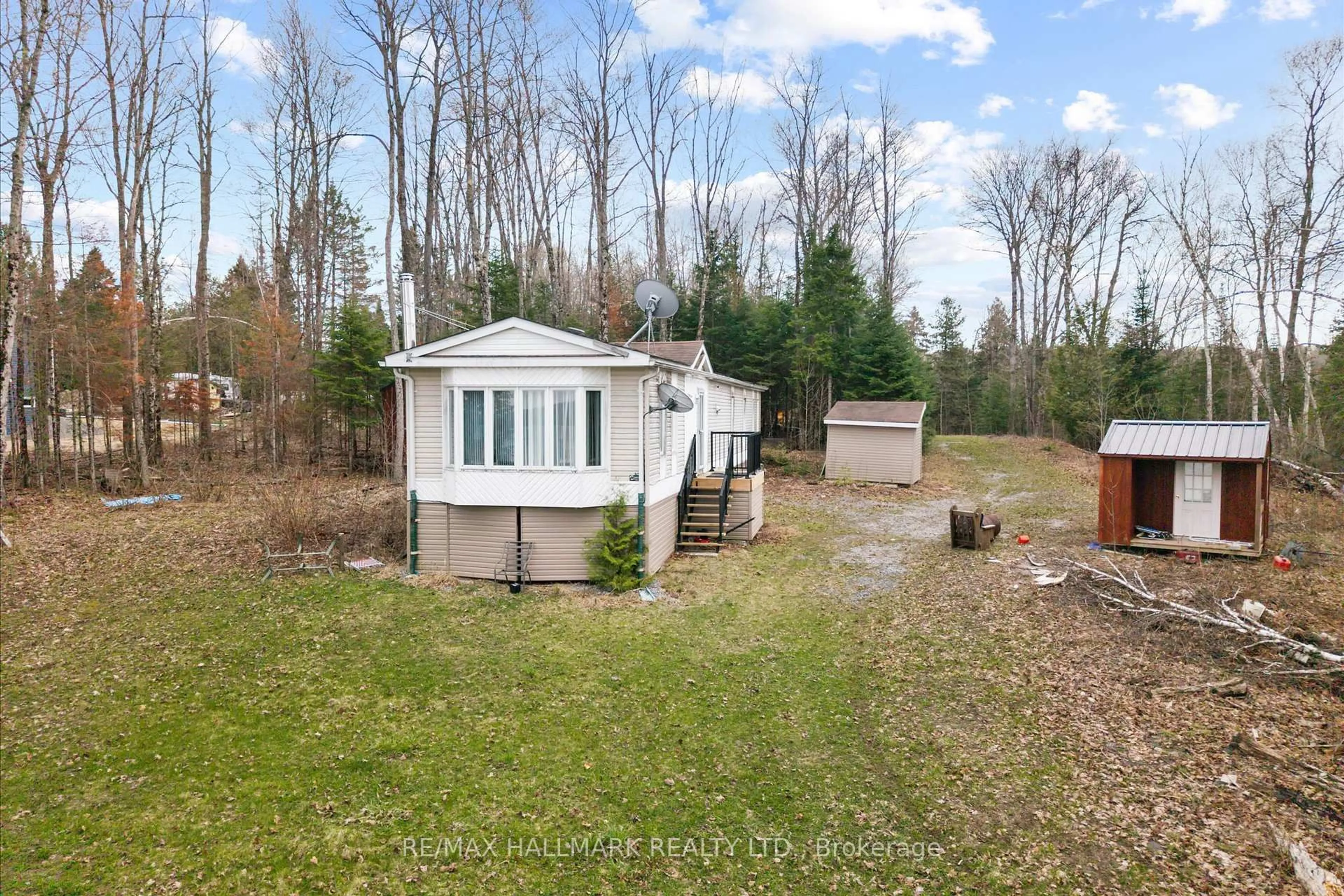 A pic from outside/outdoor area/front of a property/back of a property/a pic from drone, unknown for 2000 County Road 620 Dr, North Kawartha Ontario K0L 1A0