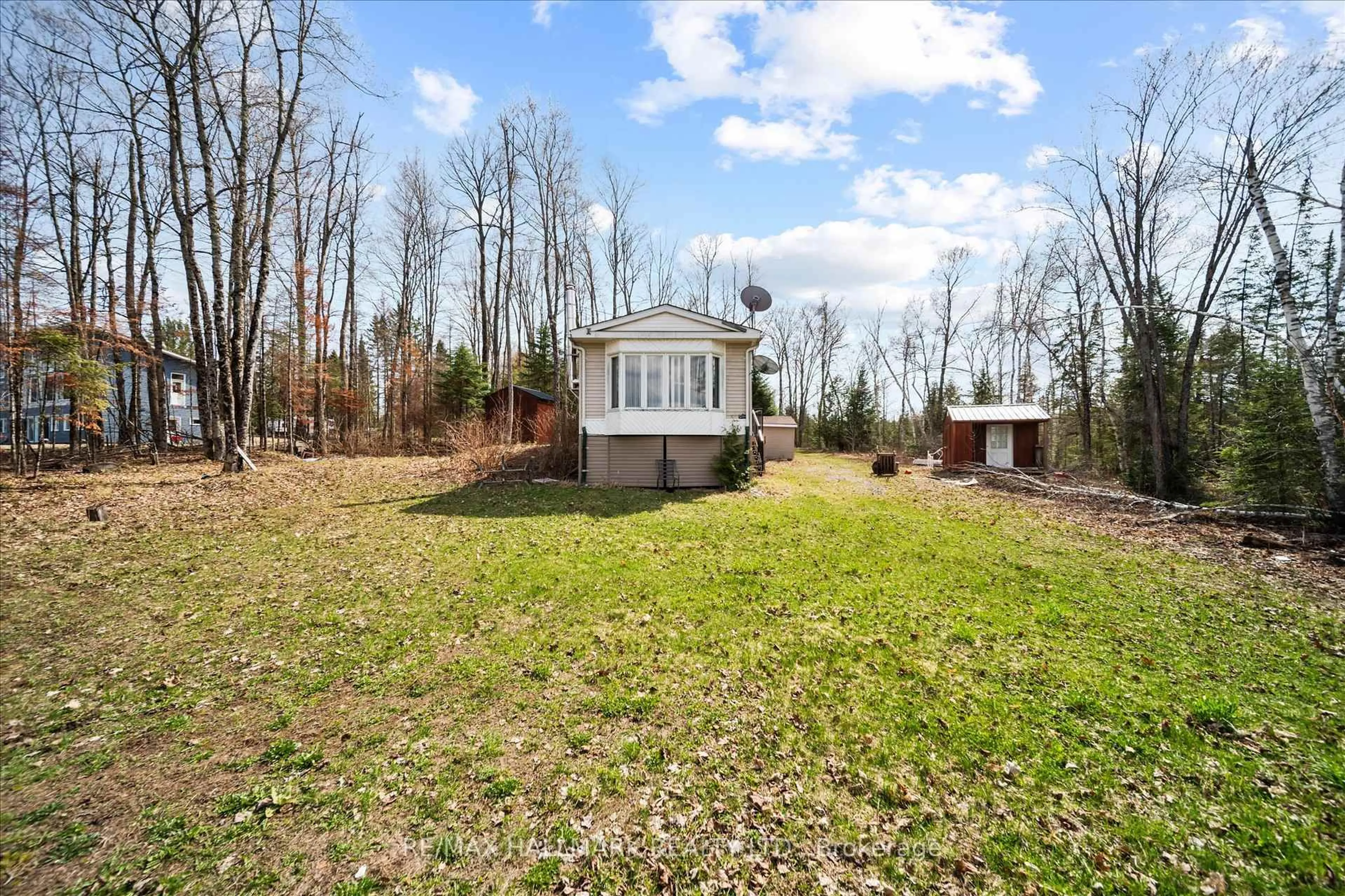 A pic from outside/outdoor area/front of a property/back of a property/a pic from drone, unknown for 2000 County Road 620 Dr, North Kawartha Ontario K0L 1A0