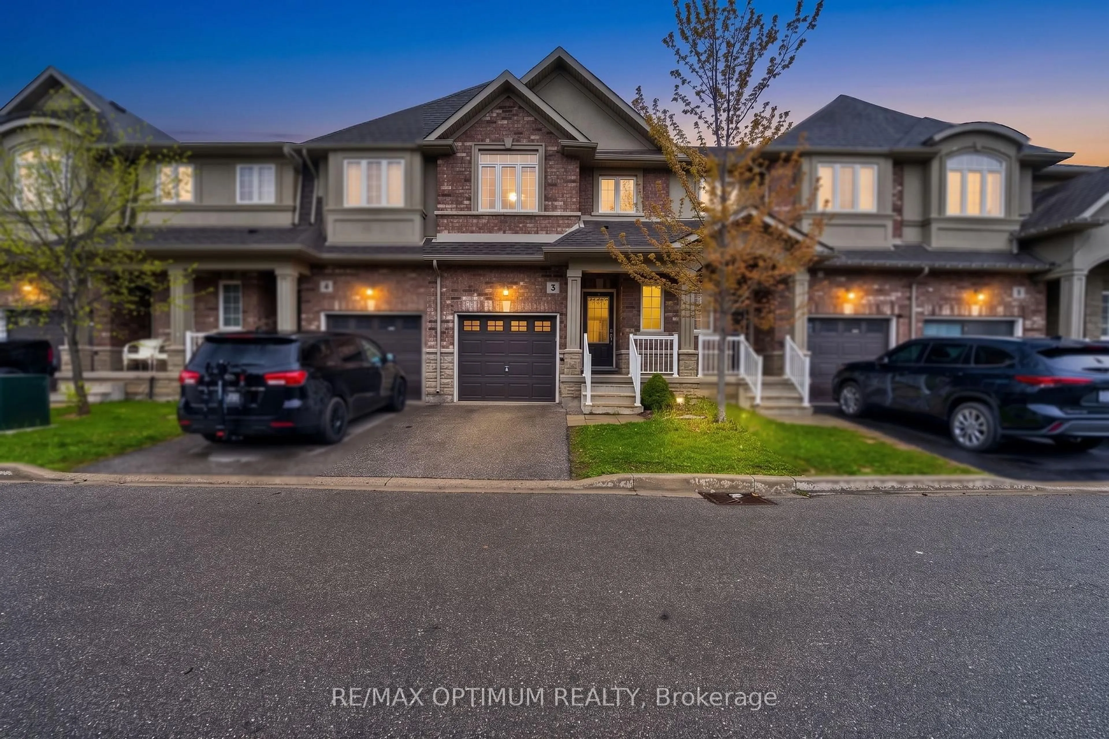 A pic from outside/outdoor area/front of a property/back of a property/a pic from drone, street for 21 Madonna Dr #3, Hamilton Ontario L9B 0H1