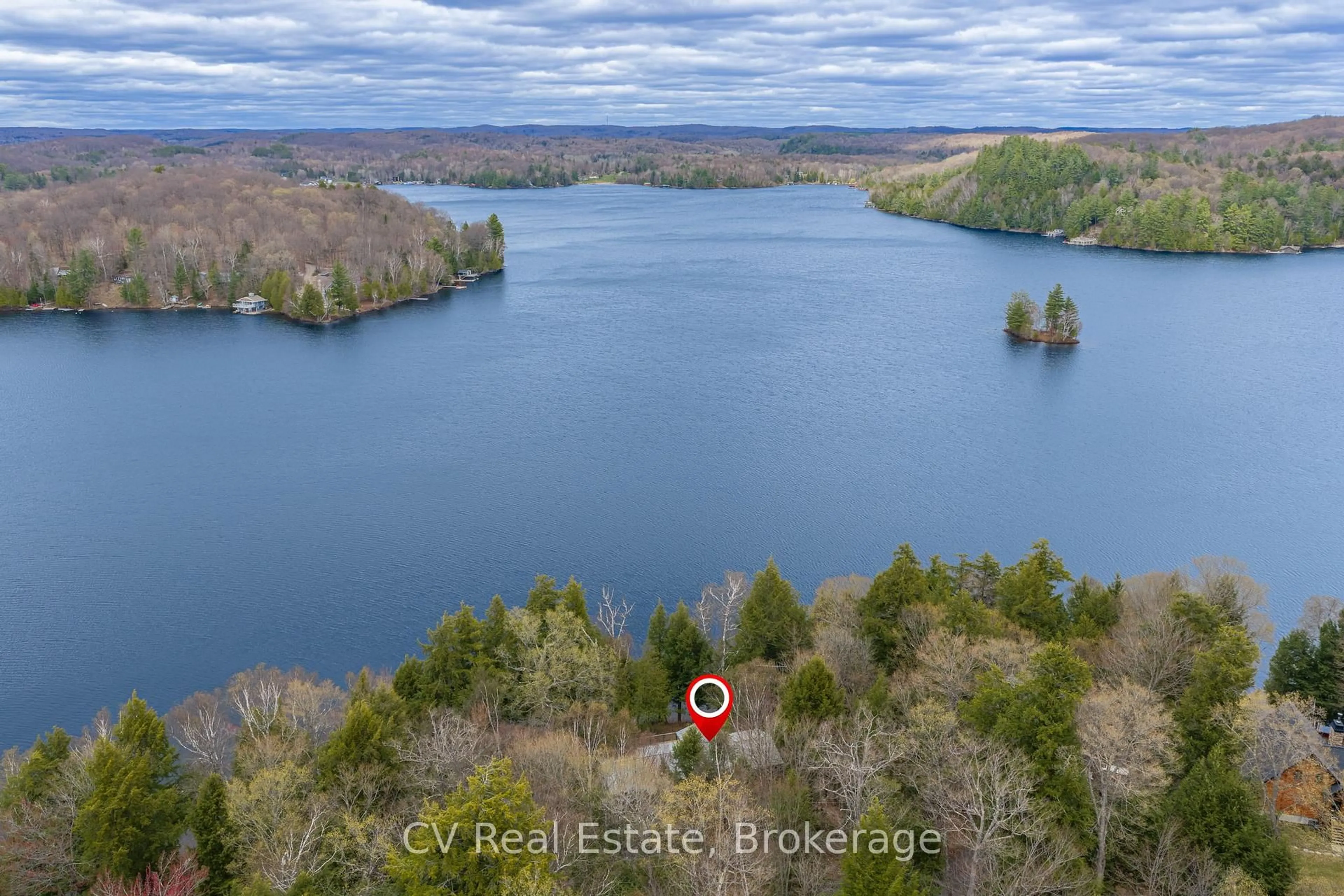 A pic from outside/outdoor area/front of a property/back of a property/a pic from drone, water/lake/river/ocean view for 1067 Osborne Pt Rd, Lake of Bays Ontario P1H 2J3