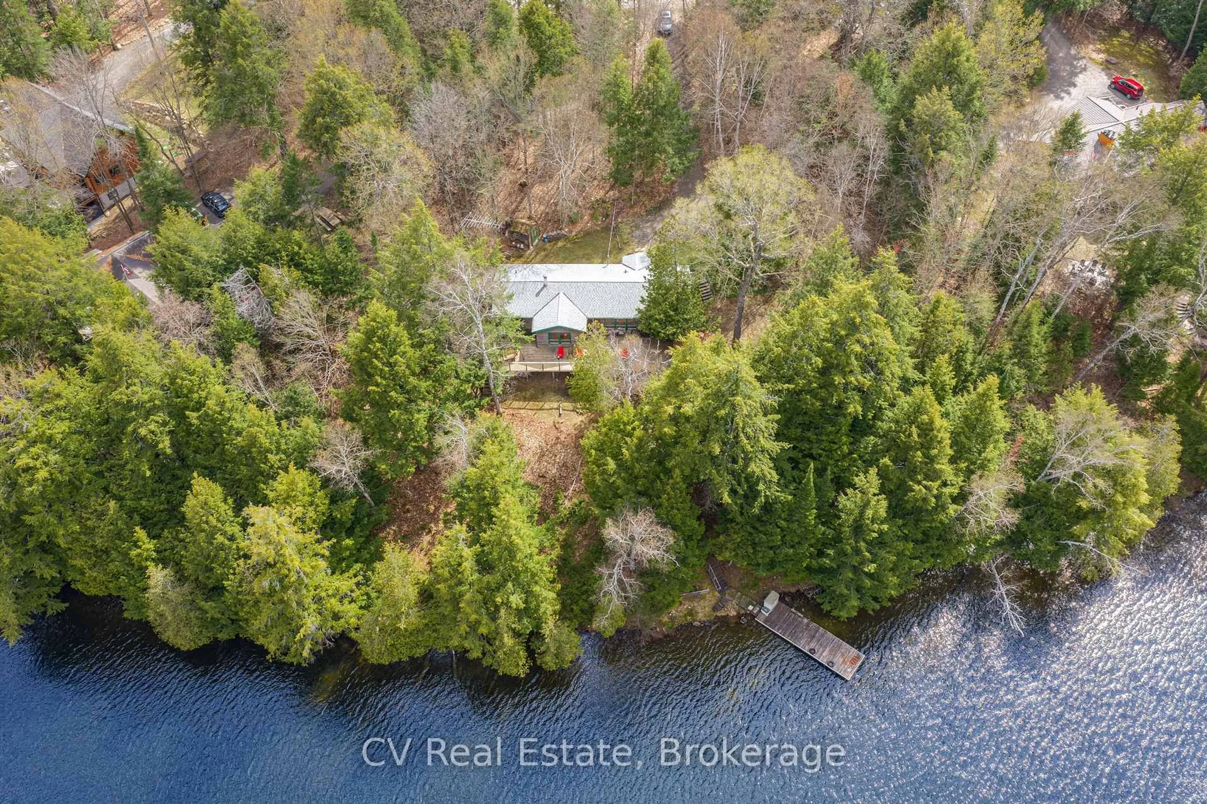 A pic from outside/outdoor area/front of a property/back of a property/a pic from drone, water/lake/river/ocean view for 1067 Osborne Pt Rd, Lake of Bays Ontario P1H 2J3
