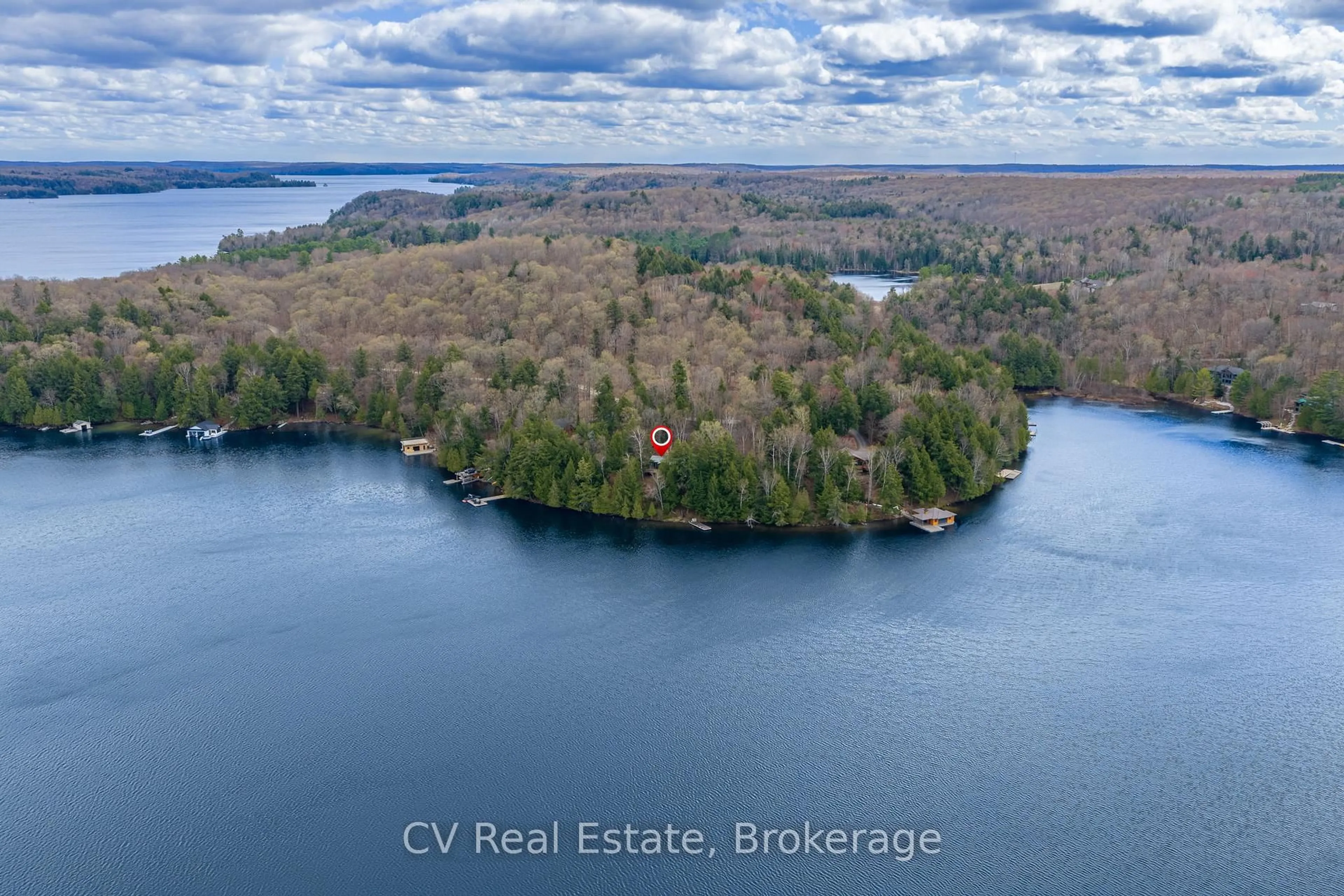 A pic from outside/outdoor area/front of a property/back of a property/a pic from drone, water/lake/river/ocean view for 1067 Osborne Pt Rd, Lake of Bays Ontario P1H 2J3