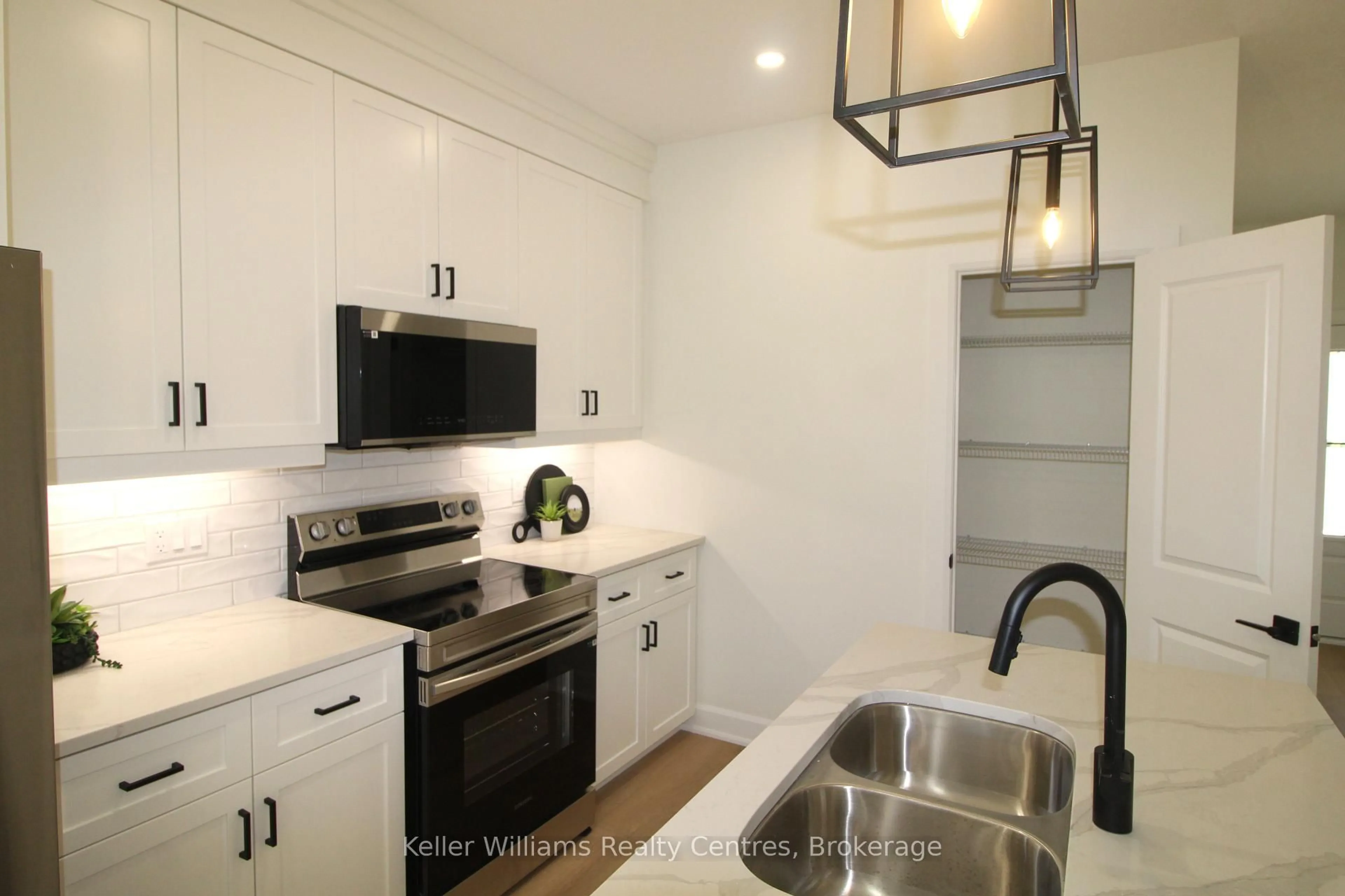 Open concept kitchen, ceramic/tile floor for 126 Tremble Dr, West Grey Ontario N0G 1R0