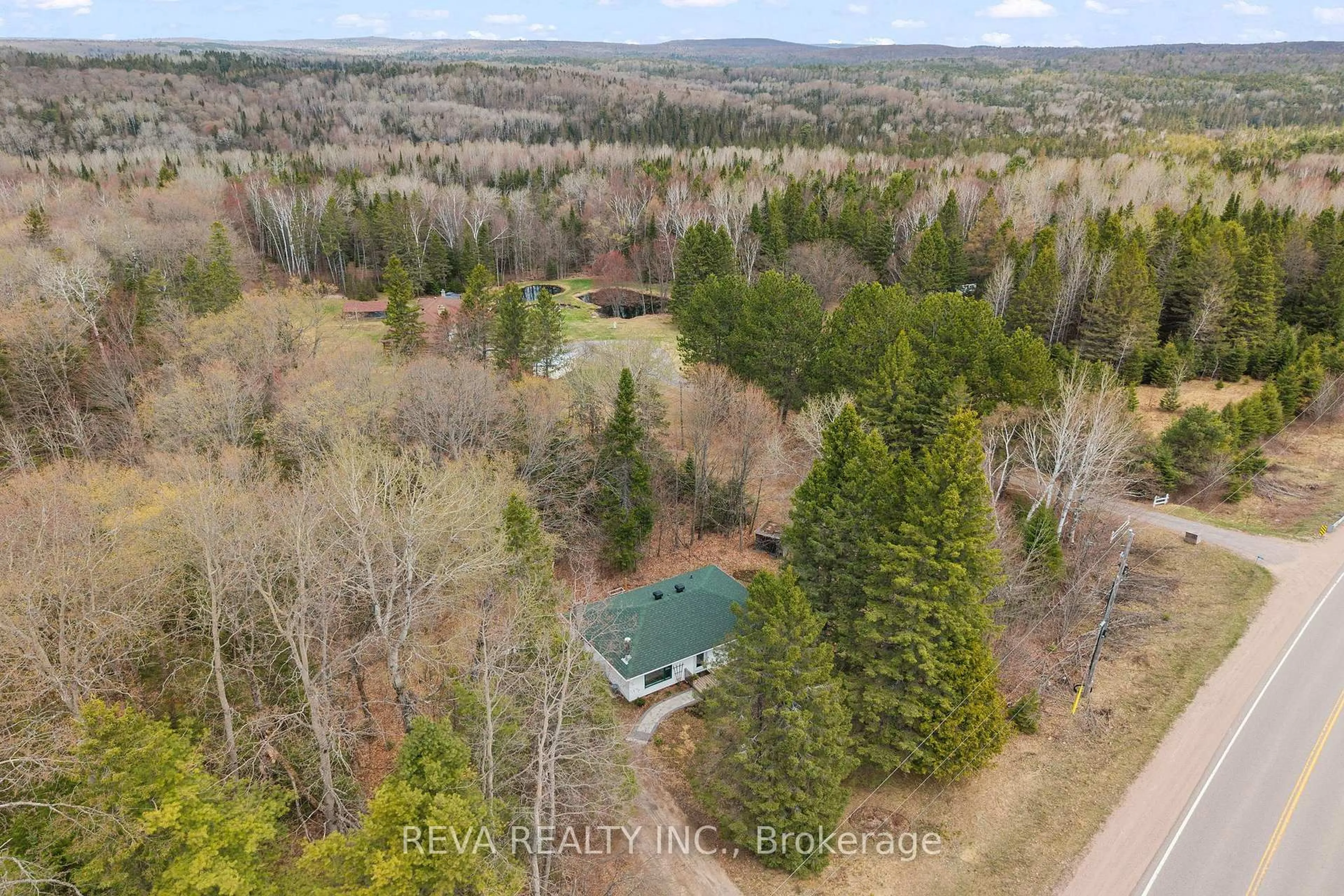 A pic from outside/outdoor area/front of a property/back of a property/a pic from drone, forest/trees view for 33225 Highway 62, Maynooth Ontario K0L 2S0
