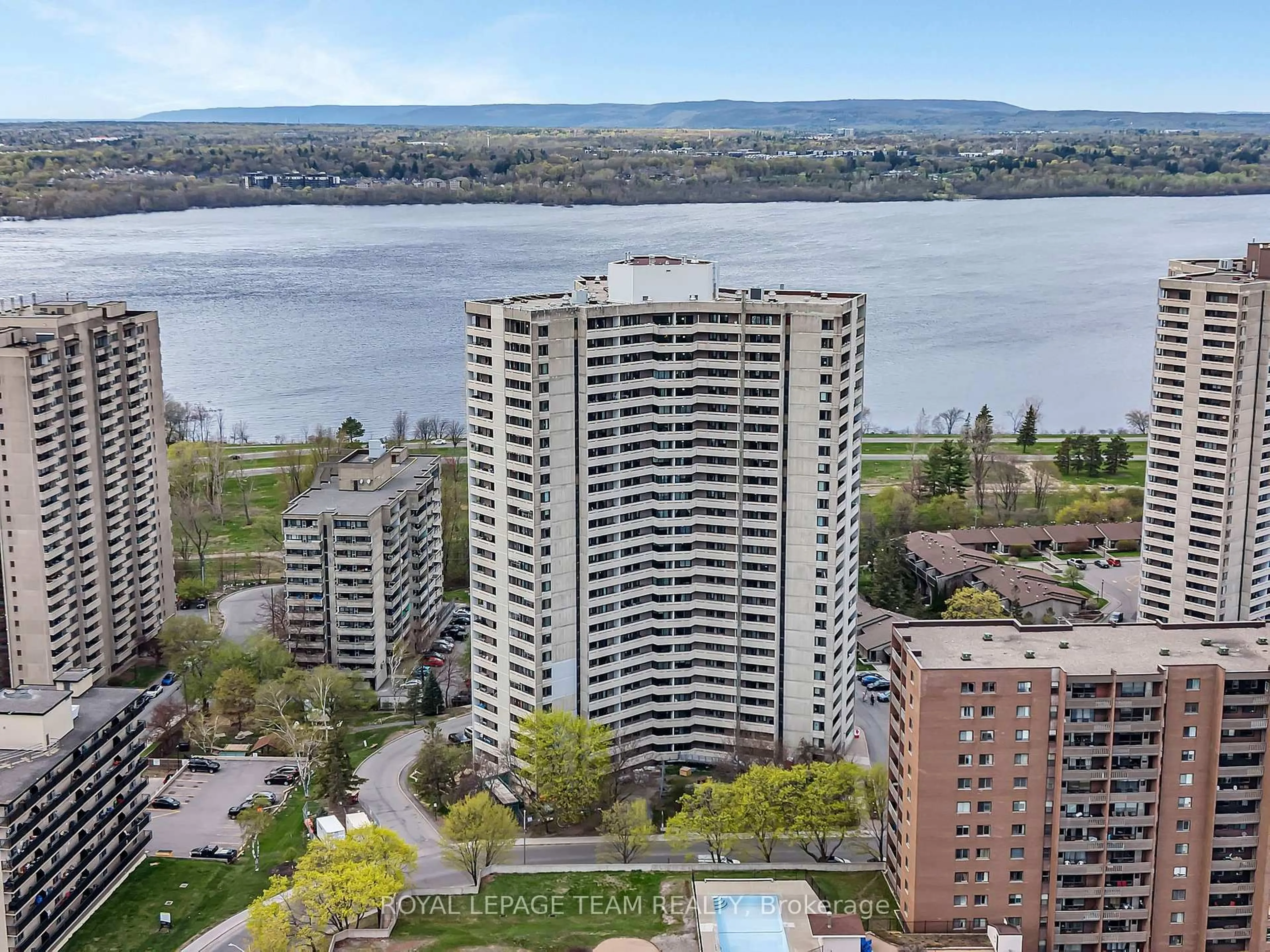 A pic from outside/outdoor area/front of a property/back of a property/a pic from drone, water/lake/river/ocean view for 1171 Ambleside Dr #2309, Ottawa Ontario K2B 8E1