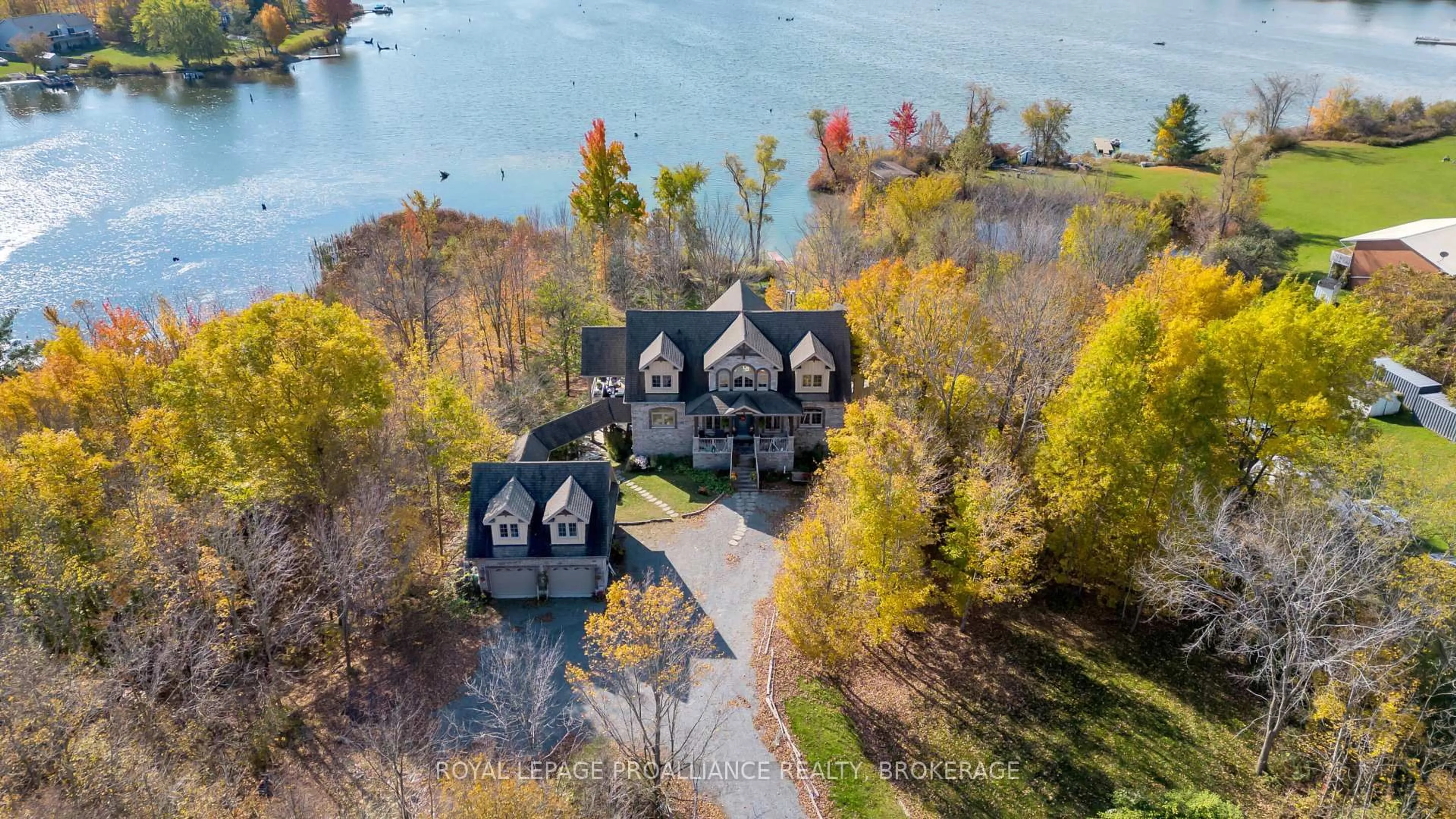 A pic from outside/outdoor area/front of a property/back of a property/a pic from drone, water/lake/river/ocean view for 1749 Ormsbee Rd, Battersea Ontario K0H 1H0