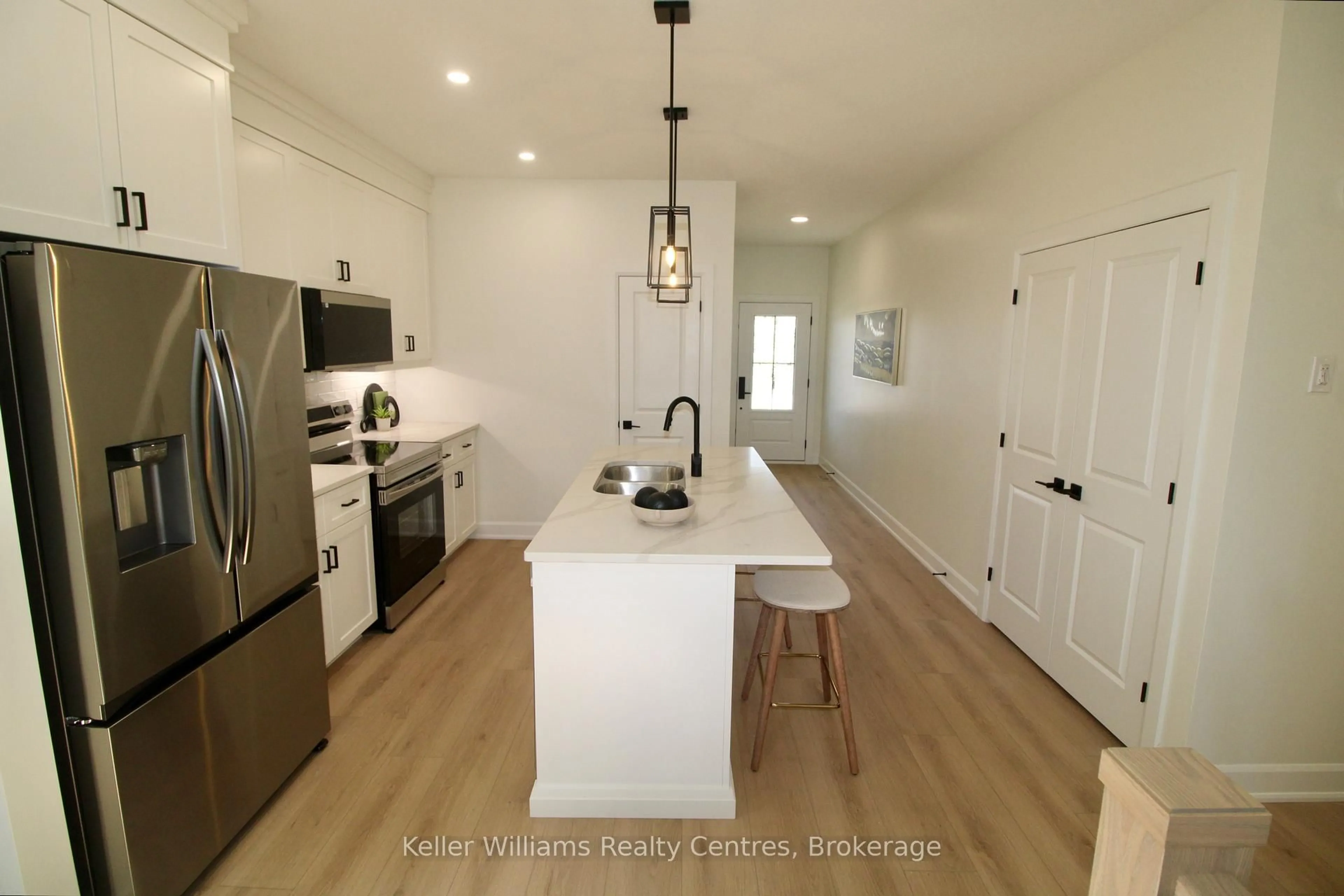 Open concept kitchen, unknown for 124 Tremble Dr, West Grey Ontario N0G 1R0