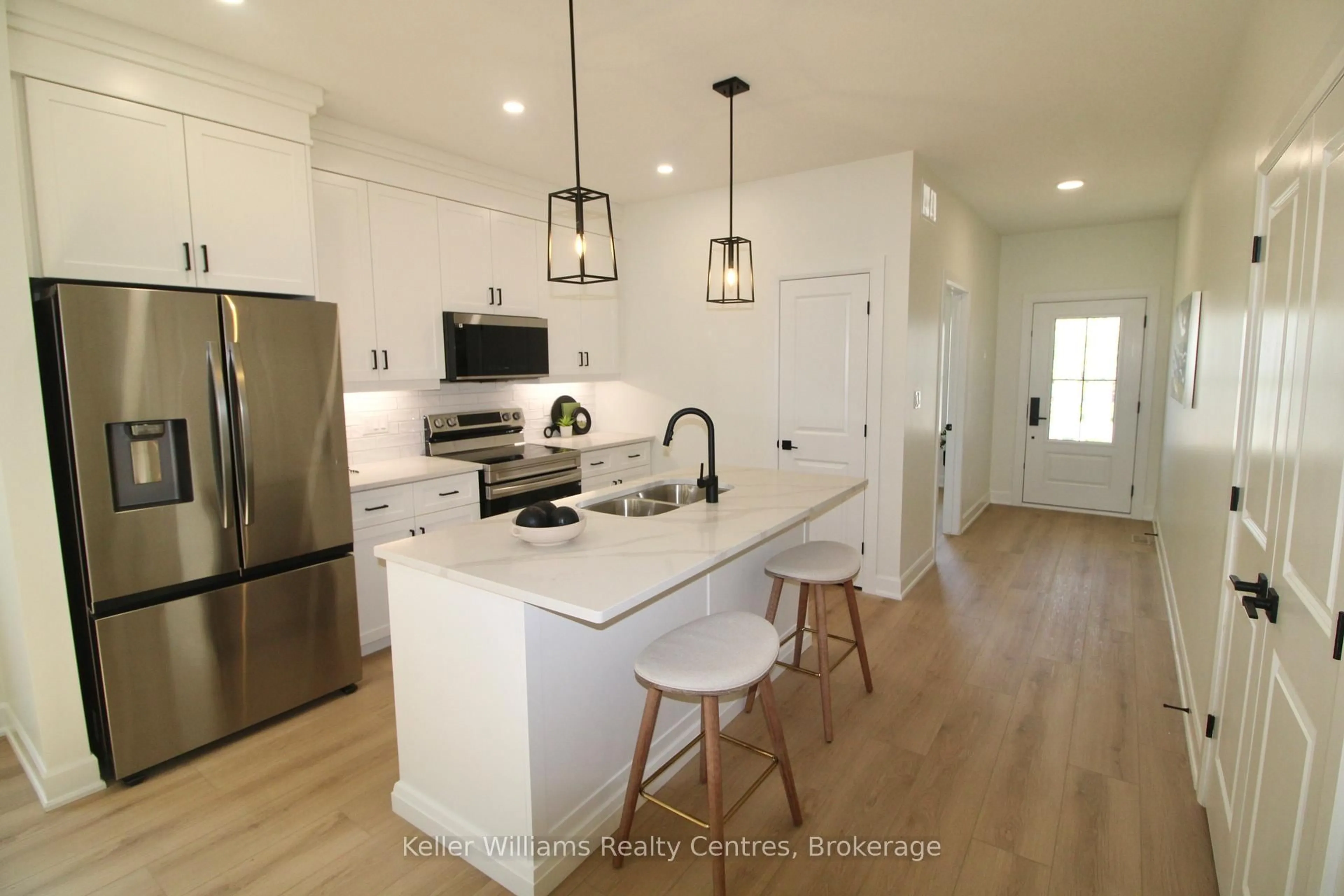 Open concept kitchen, unknown for 124 Tremble Dr, West Grey Ontario N0G 1R0