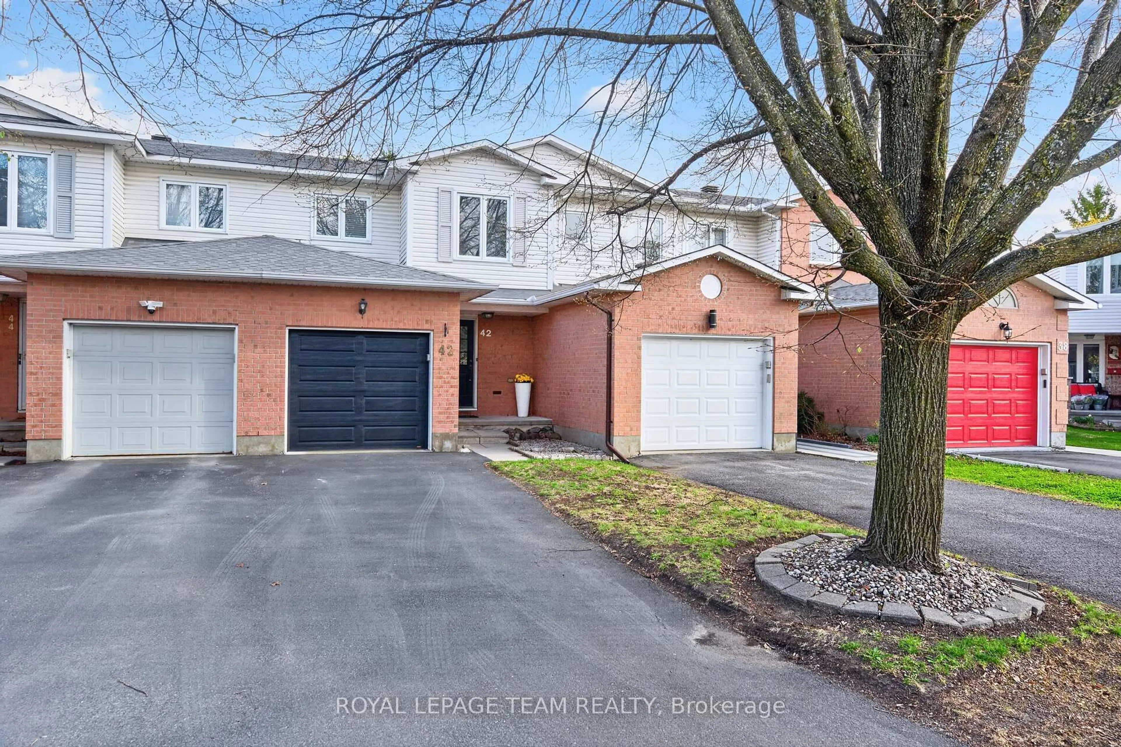 Home with brick exterior material, street for 42 Baton Crt, Kanata Ontario K2L 4C8