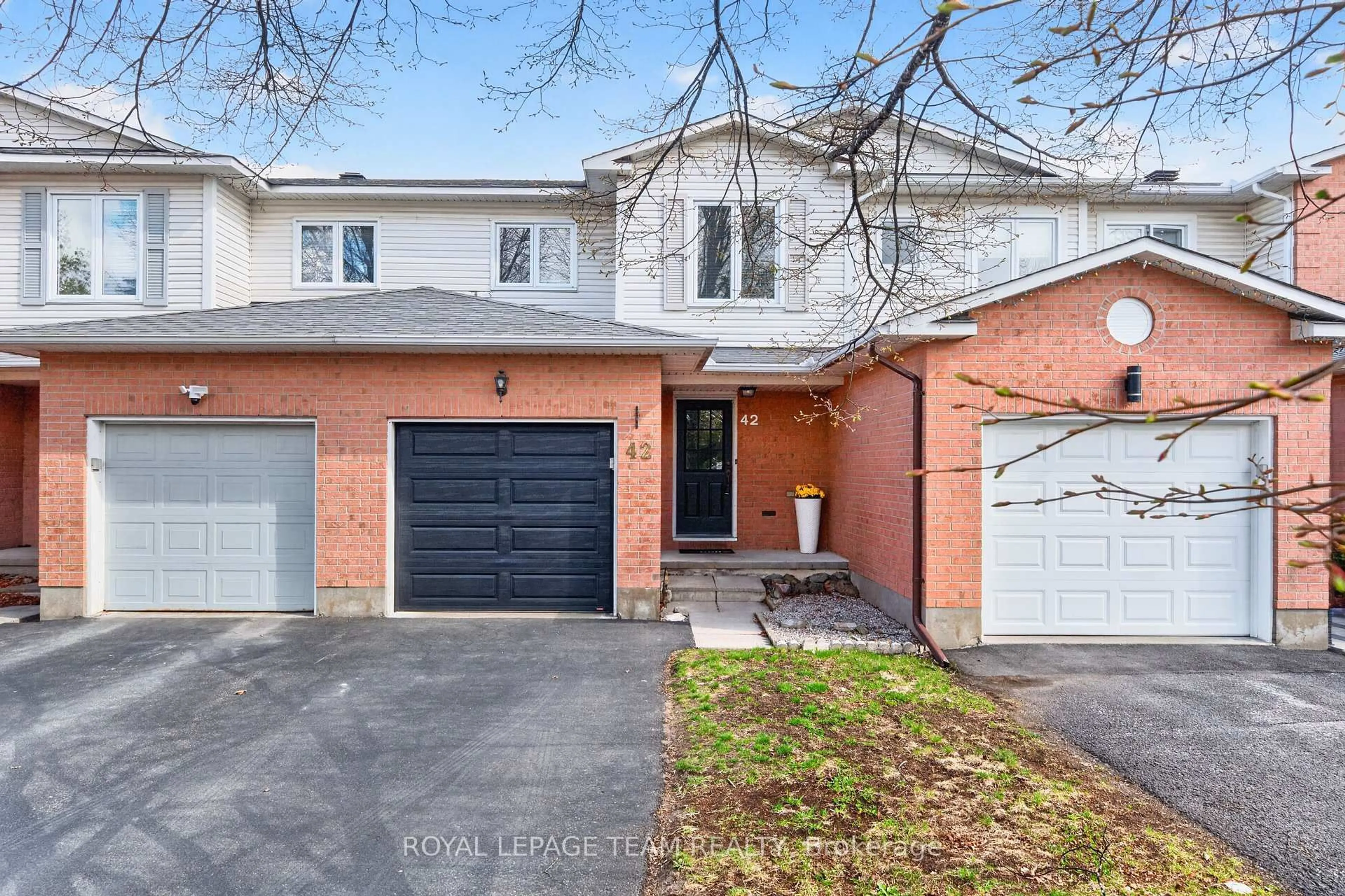 Home with brick exterior material, street for 42 Baton Crt, Kanata Ontario K2L 4C8
