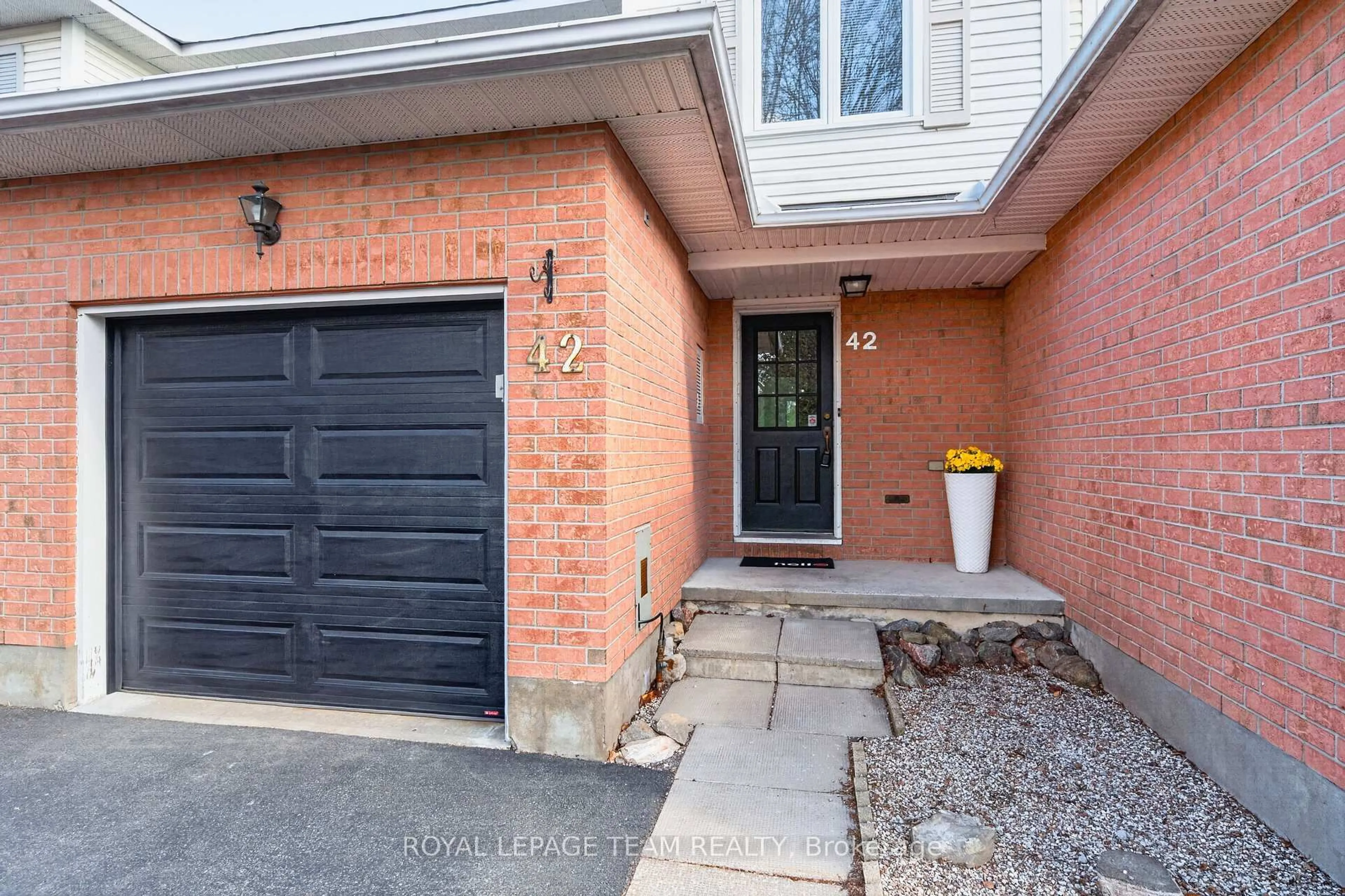 Home with brick exterior material, street for 42 Baton Crt, Kanata Ontario K2L 4C8