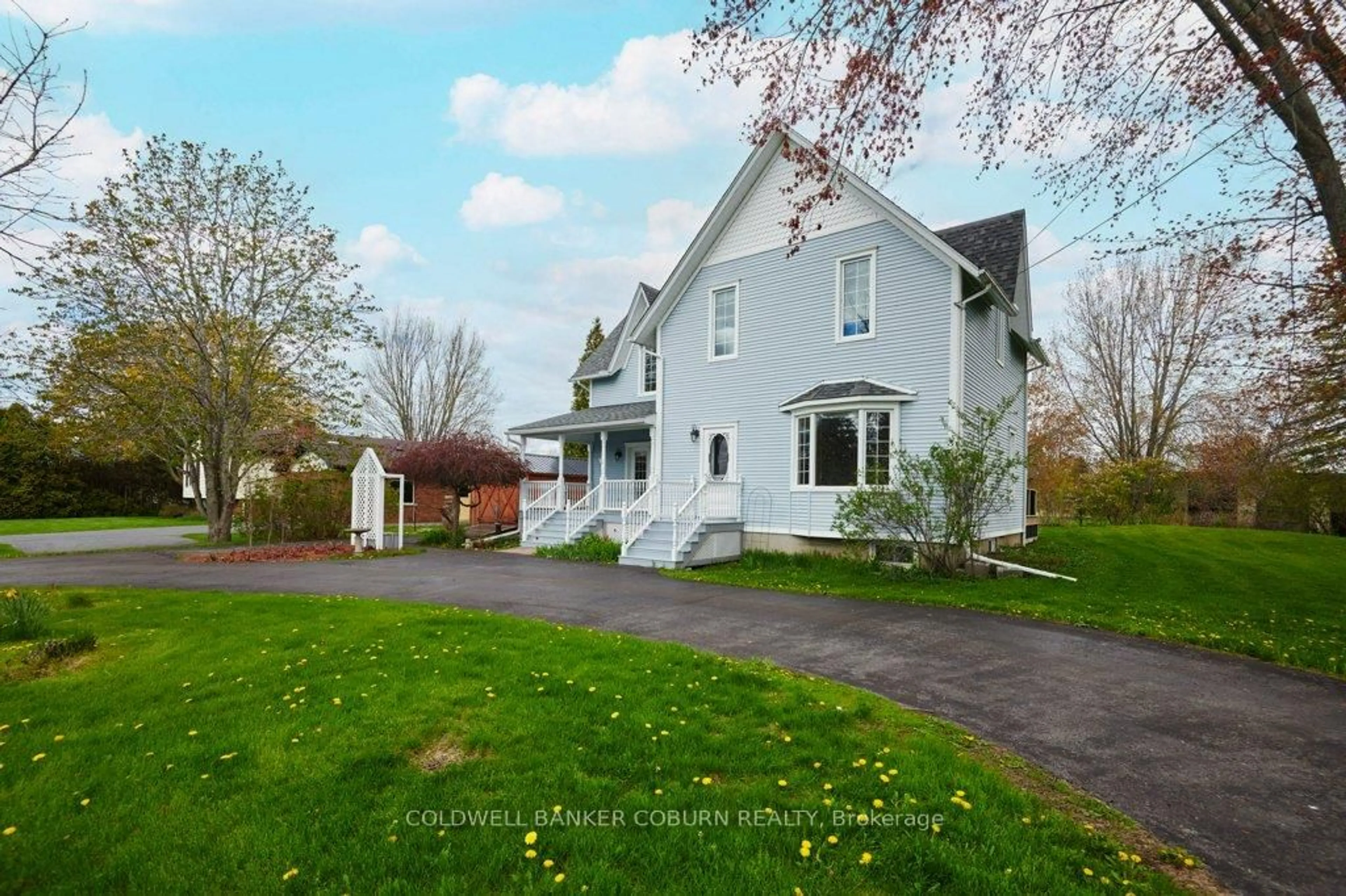 A pic from outside/outdoor area/front of a property/back of a property/a pic from drone, street for 11719 Lakeshore Dr, South Dundas Ontario K0C 1X0