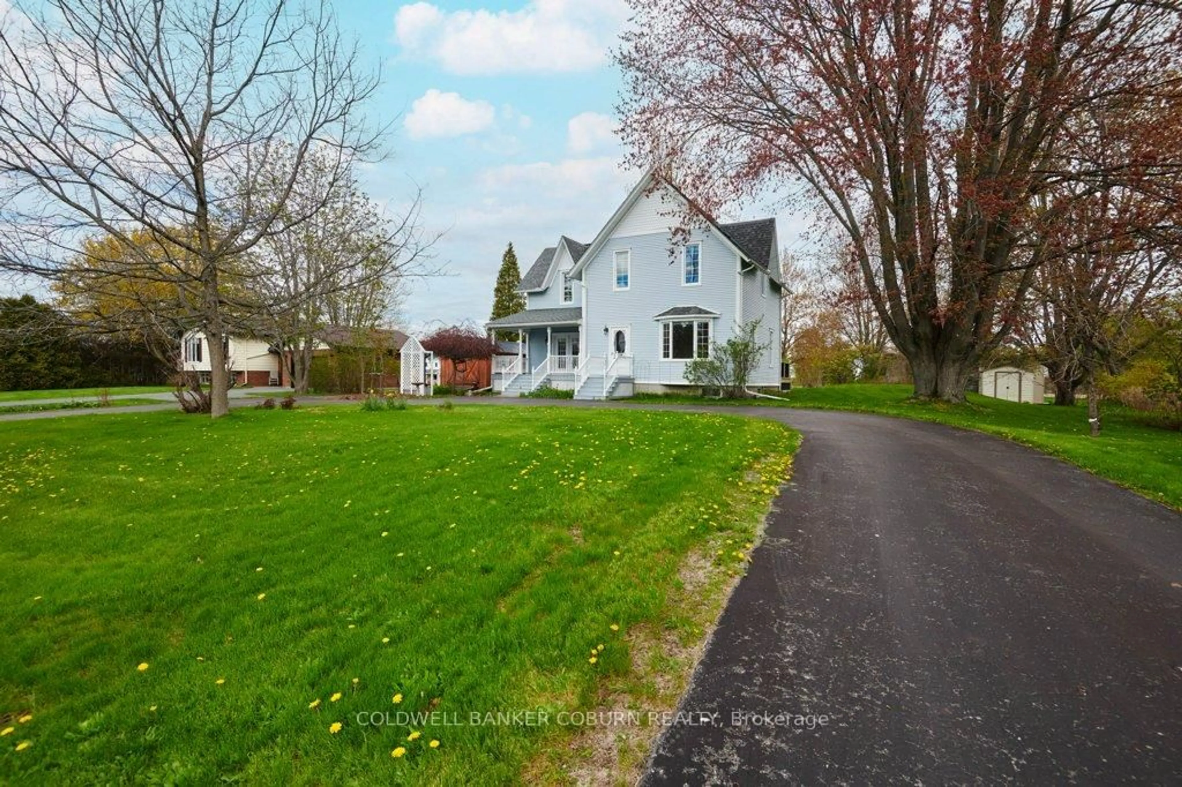 A pic from outside/outdoor area/front of a property/back of a property/a pic from drone, street for 11719 Lakeshore Dr, South Dundas Ontario K0C 1X0