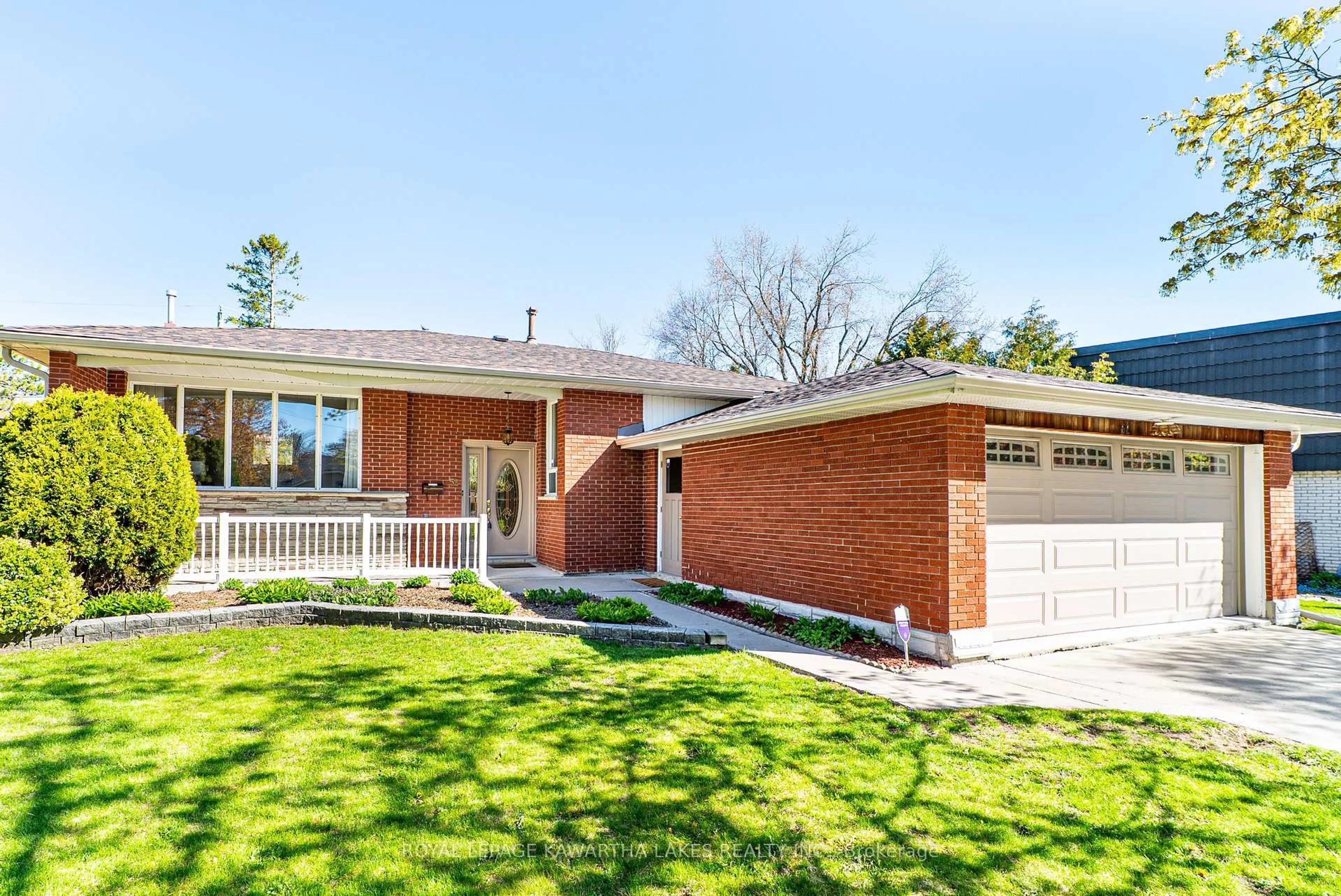 Home with brick exterior material, street for 52 Sanderling Cres, Kawartha Lakes Ontario K9V 4N2