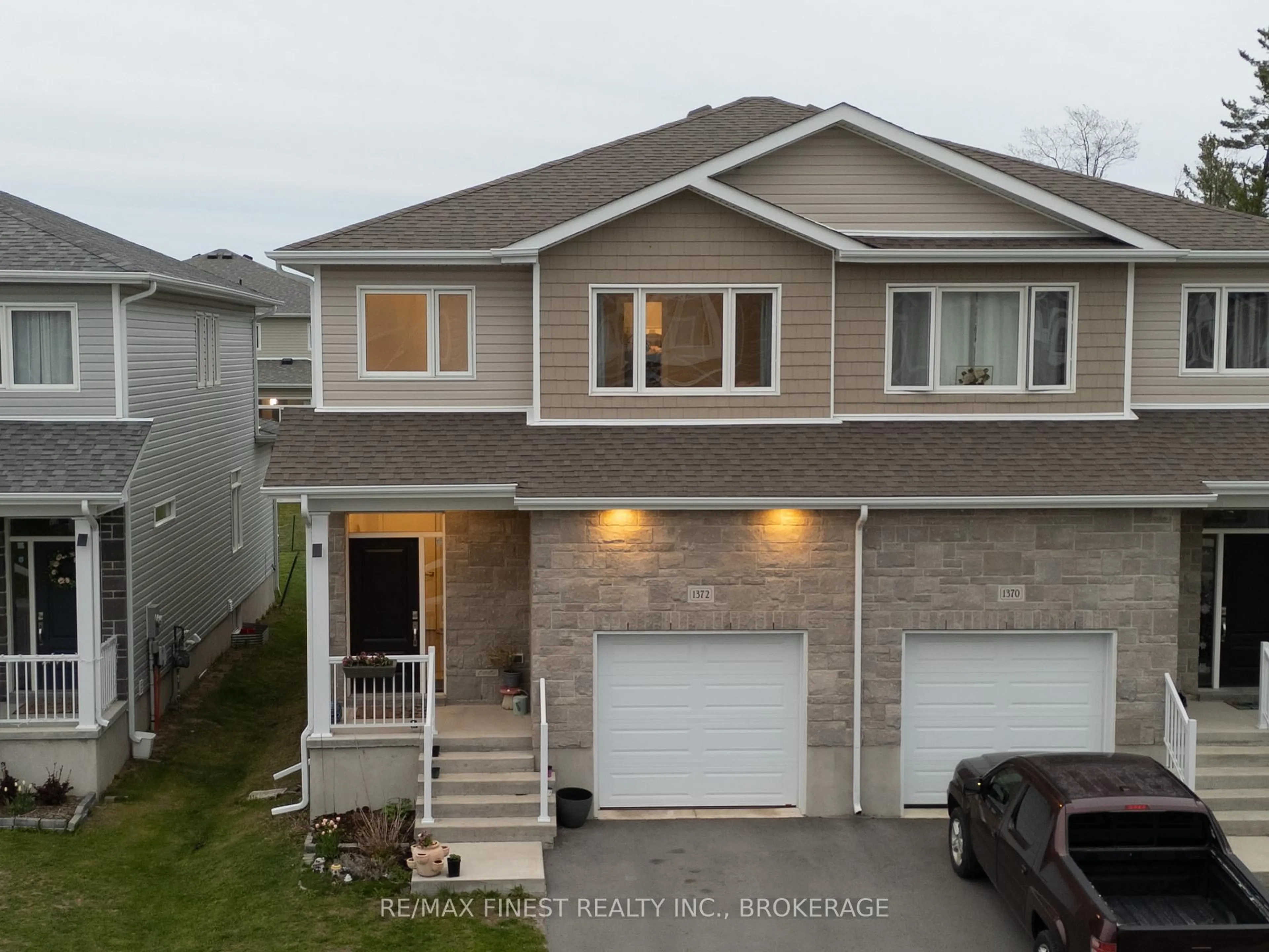 Home with vinyl exterior material, street for 1372 Andersen Dr, Kingston Ontario K7P 0P4
