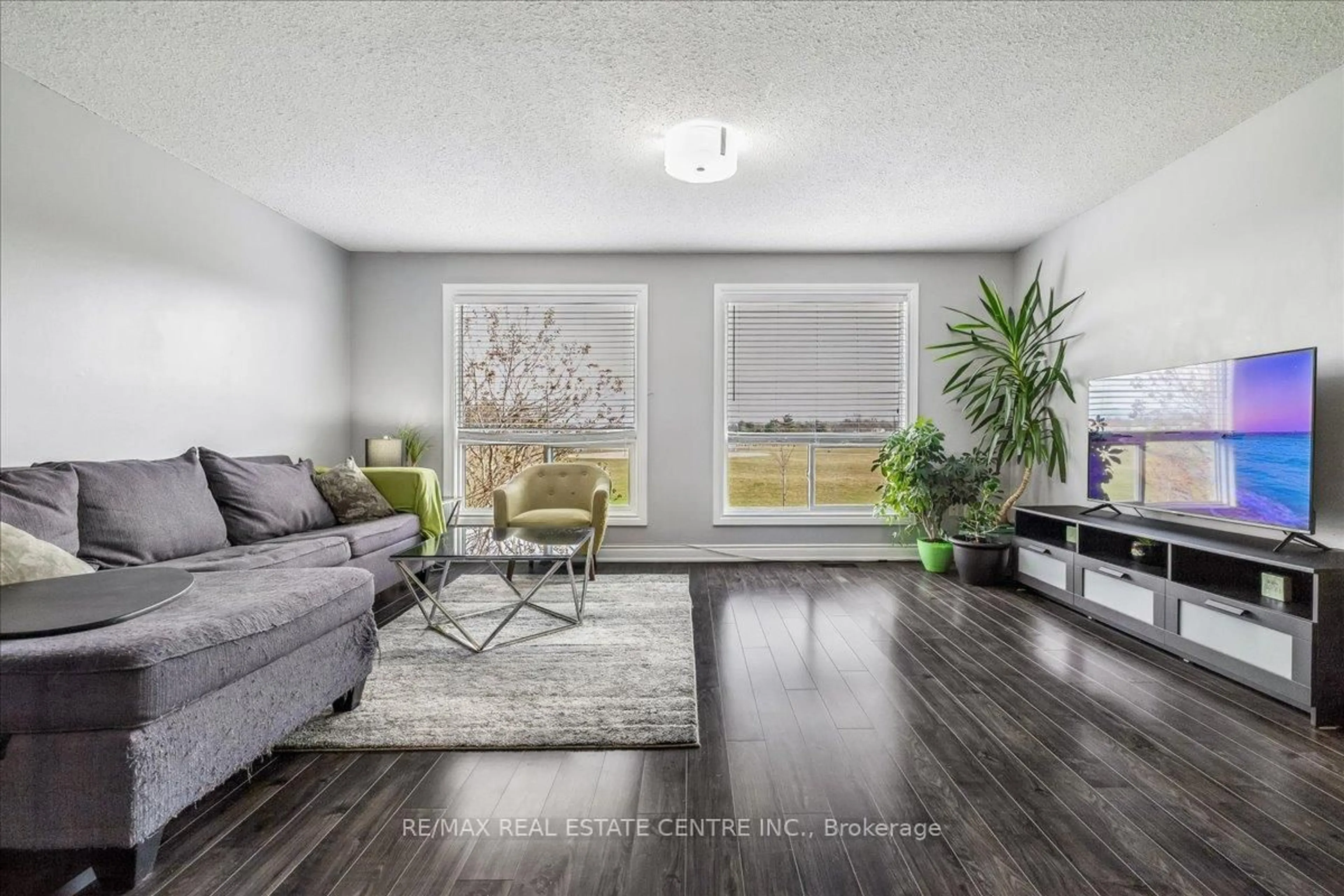 Living room with furniture, unknown for 1155 Paramount Dr #49, Hamilton Ontario L8J 2N2
