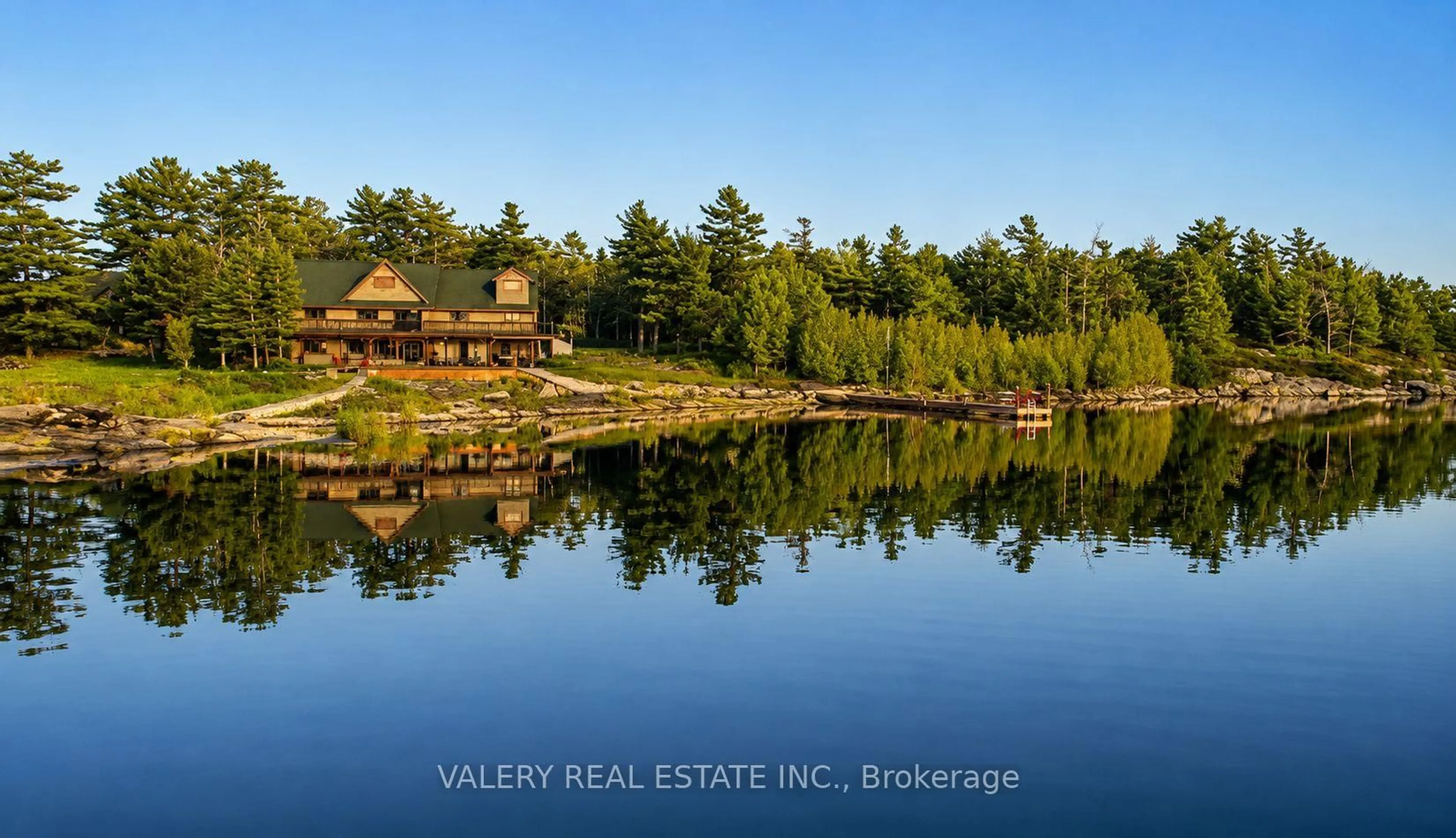 A pic from outside/outdoor area/front of a property/back of a property/a pic from drone, water/lake/river/ocean view for 20 Harrison Island, The Archipelago Ontario P0G 1K0