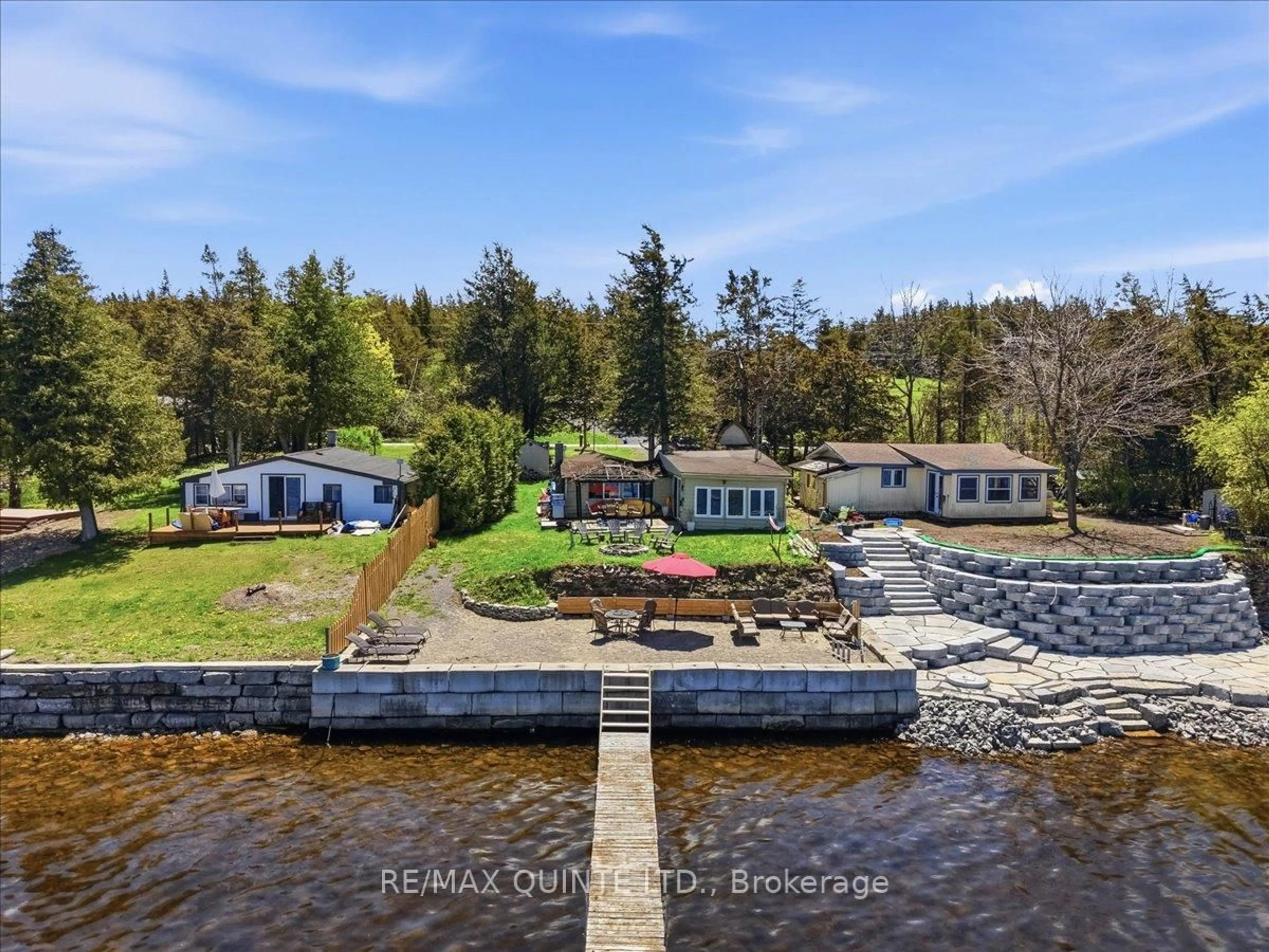 A pic from outside/outdoor area/front of a property/back of a property/a pic from drone, water/lake/river/ocean view for 1765 Big Island Rd, Prince Edward County Ontario K0K 1W0