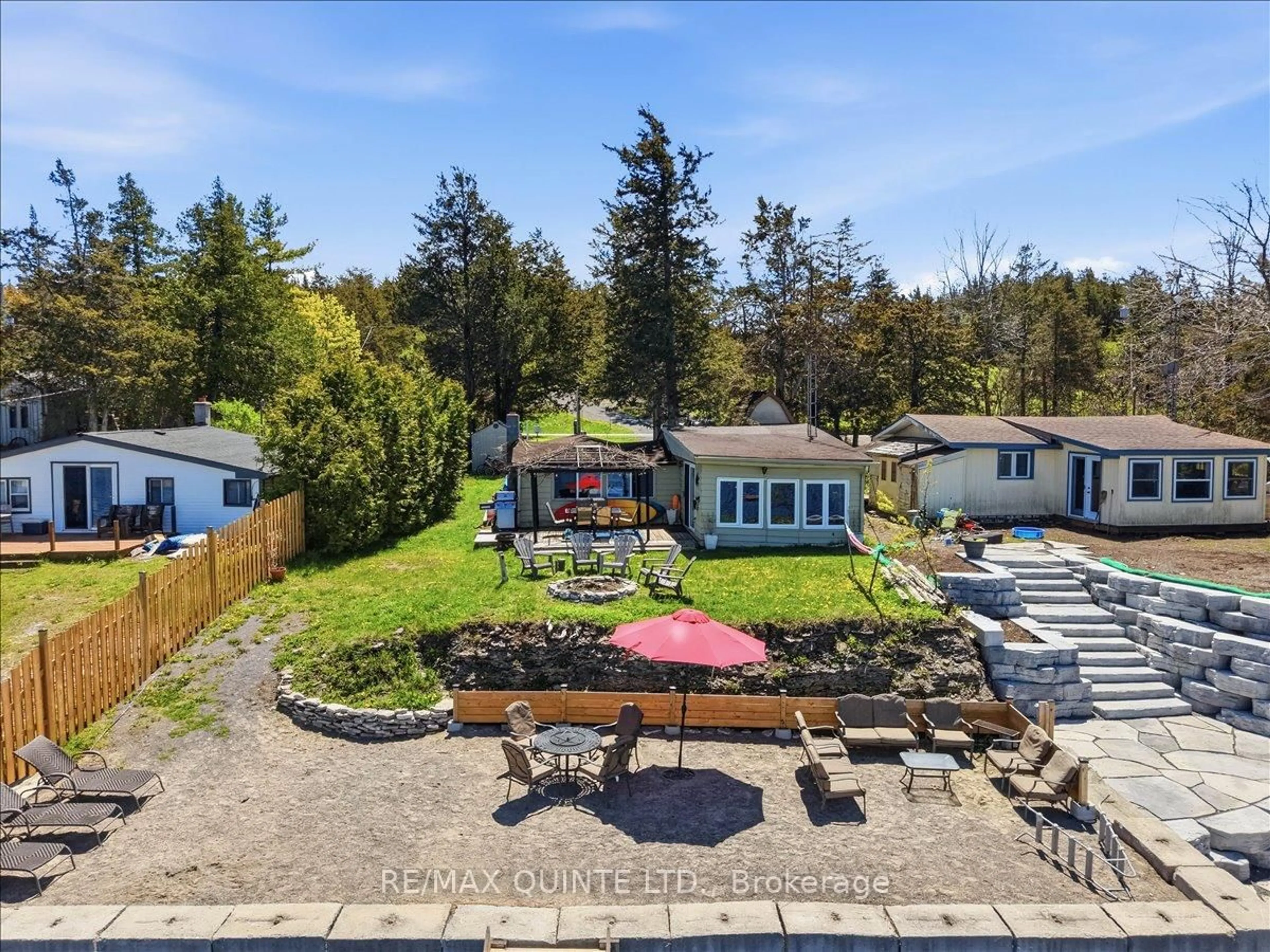 A pic from outside/outdoor area/front of a property/back of a property/a pic from drone, street for 1765 Big Island Rd, Prince Edward County Ontario K0K 1W0