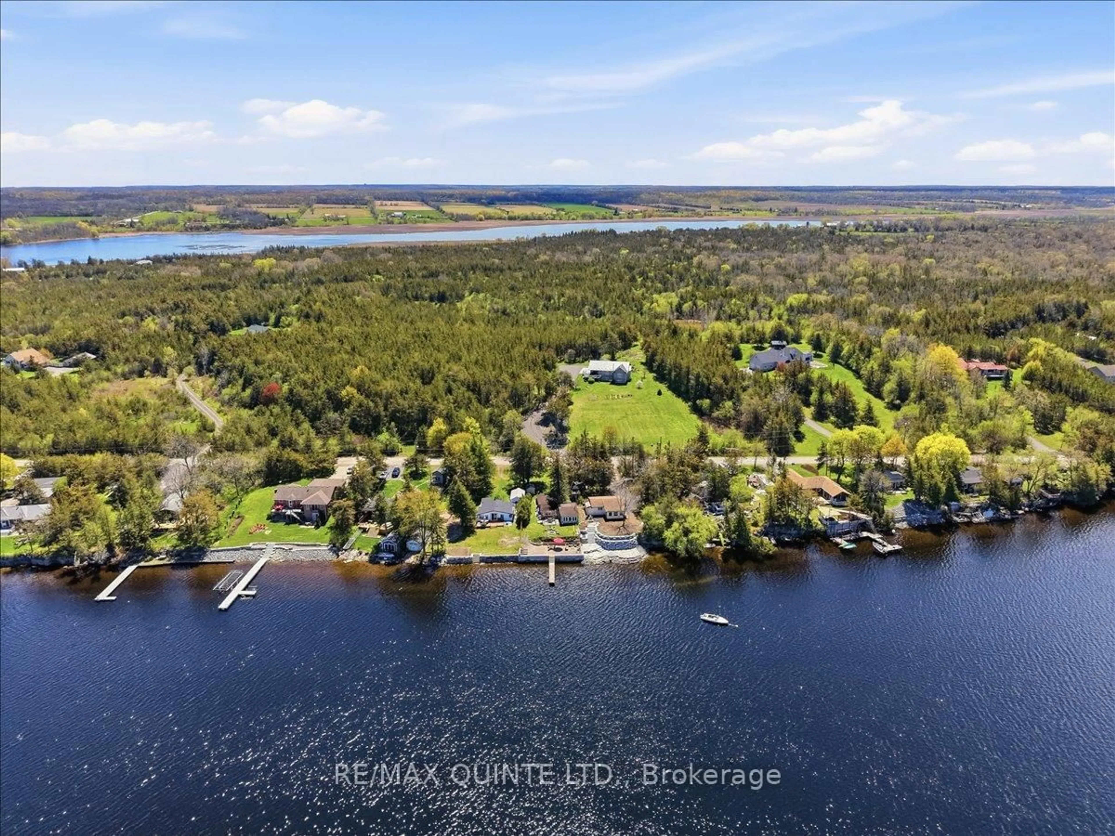 A pic from outside/outdoor area/front of a property/back of a property/a pic from drone, water/lake/river/ocean view for 1765 Big Island Rd, Prince Edward County Ontario K0K 1W0
