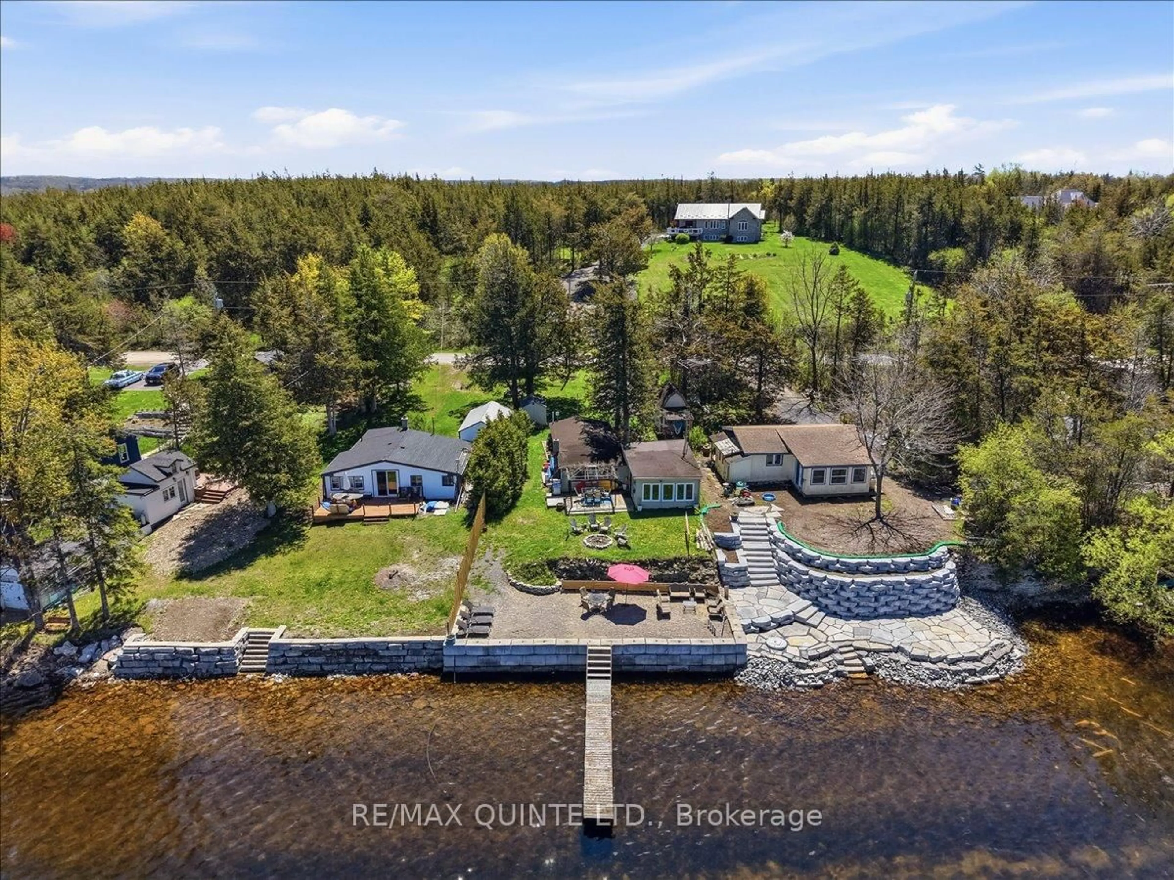 A pic from outside/outdoor area/front of a property/back of a property/a pic from drone, water/lake/river/ocean view for 1765 Big Island Rd, Prince Edward County Ontario K0K 1W0