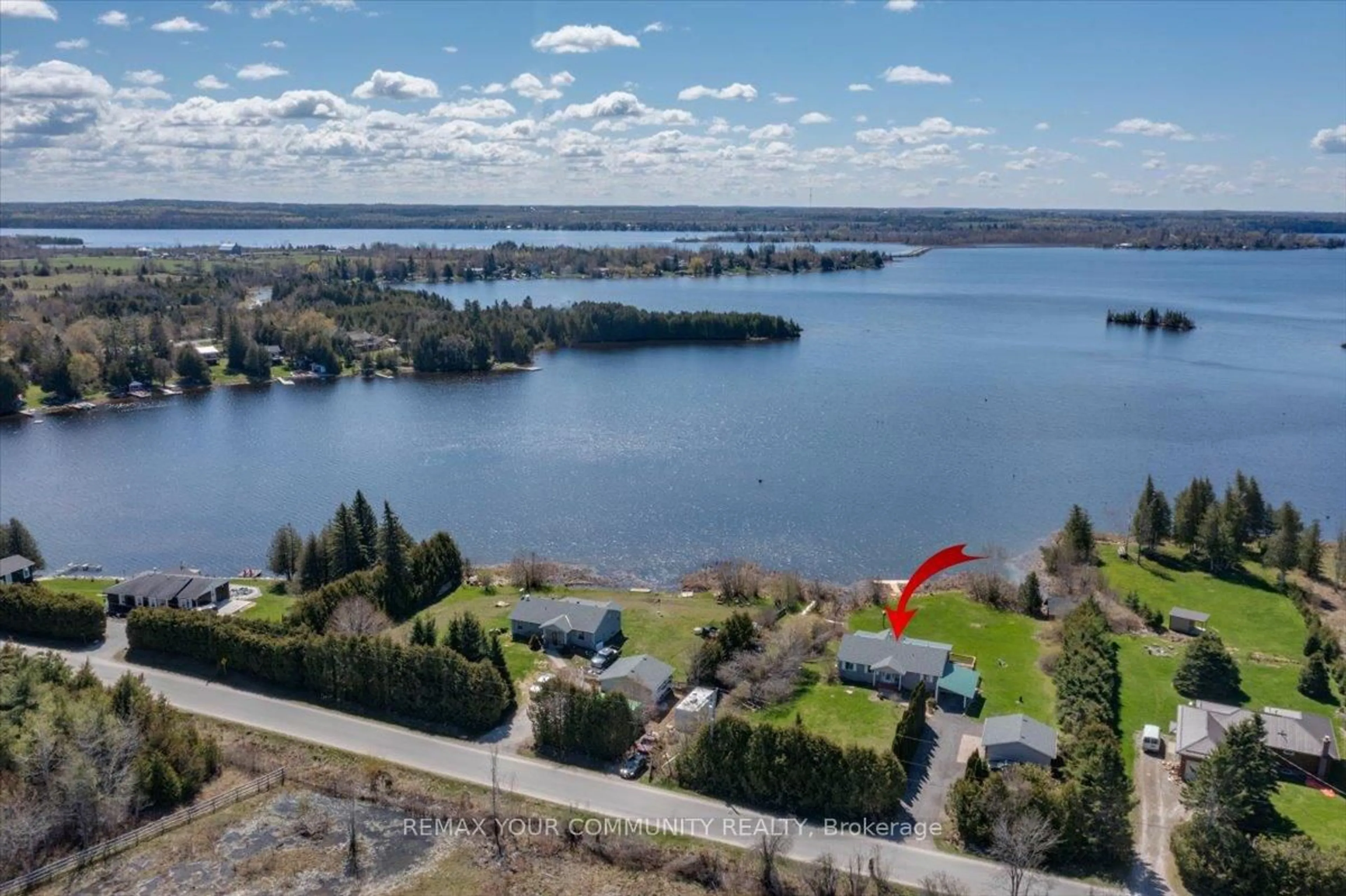 A pic from outside/outdoor area/front of a property/back of a property/a pic from drone, water/lake/river/ocean view for 586 Rohallion Rd, Kawartha Lakes Ontario L0K 1B0