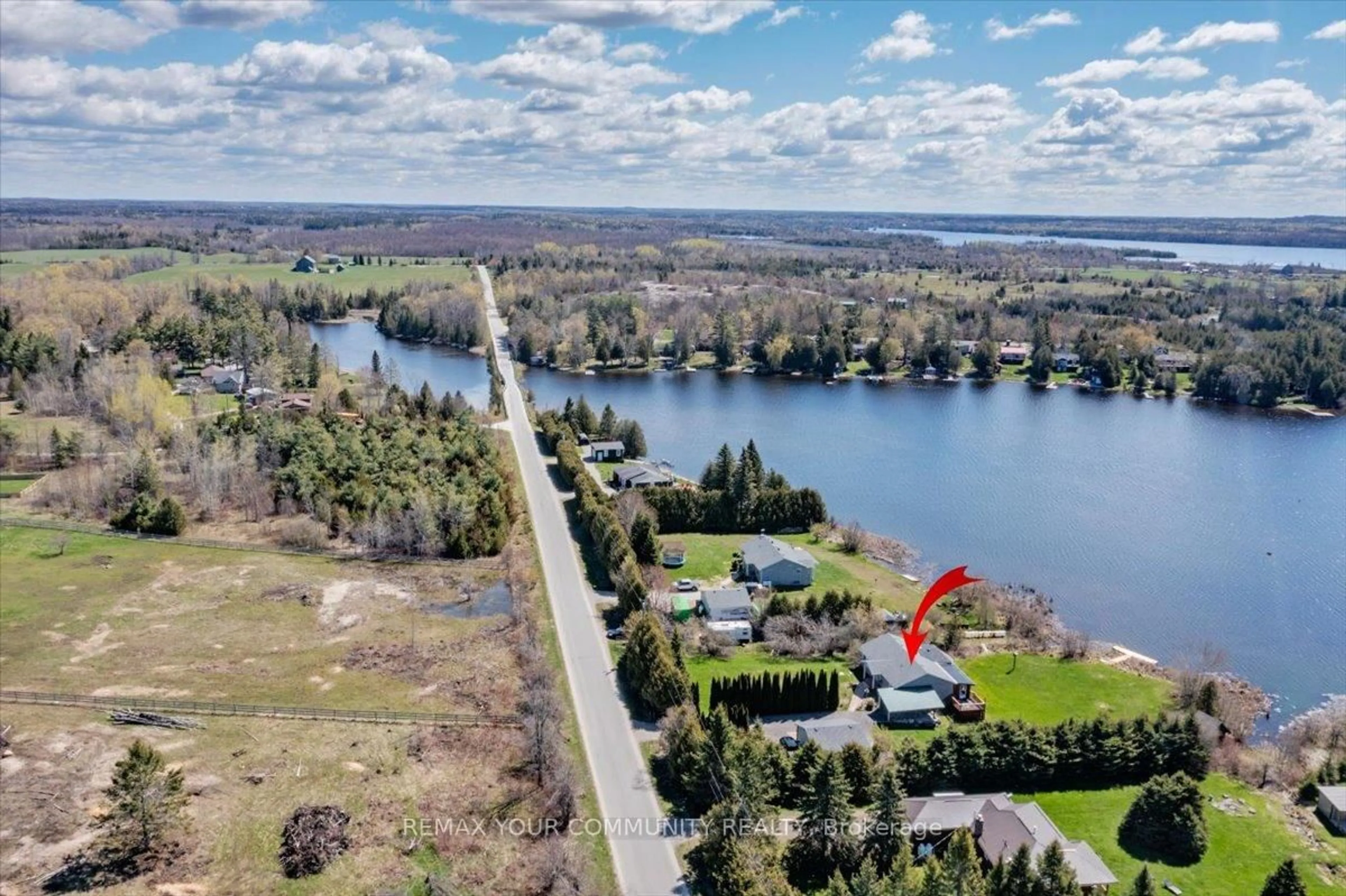 A pic from outside/outdoor area/front of a property/back of a property/a pic from drone, water/lake/river/ocean view for 586 Rohallion Rd, Kawartha Lakes Ontario L0K 1B0