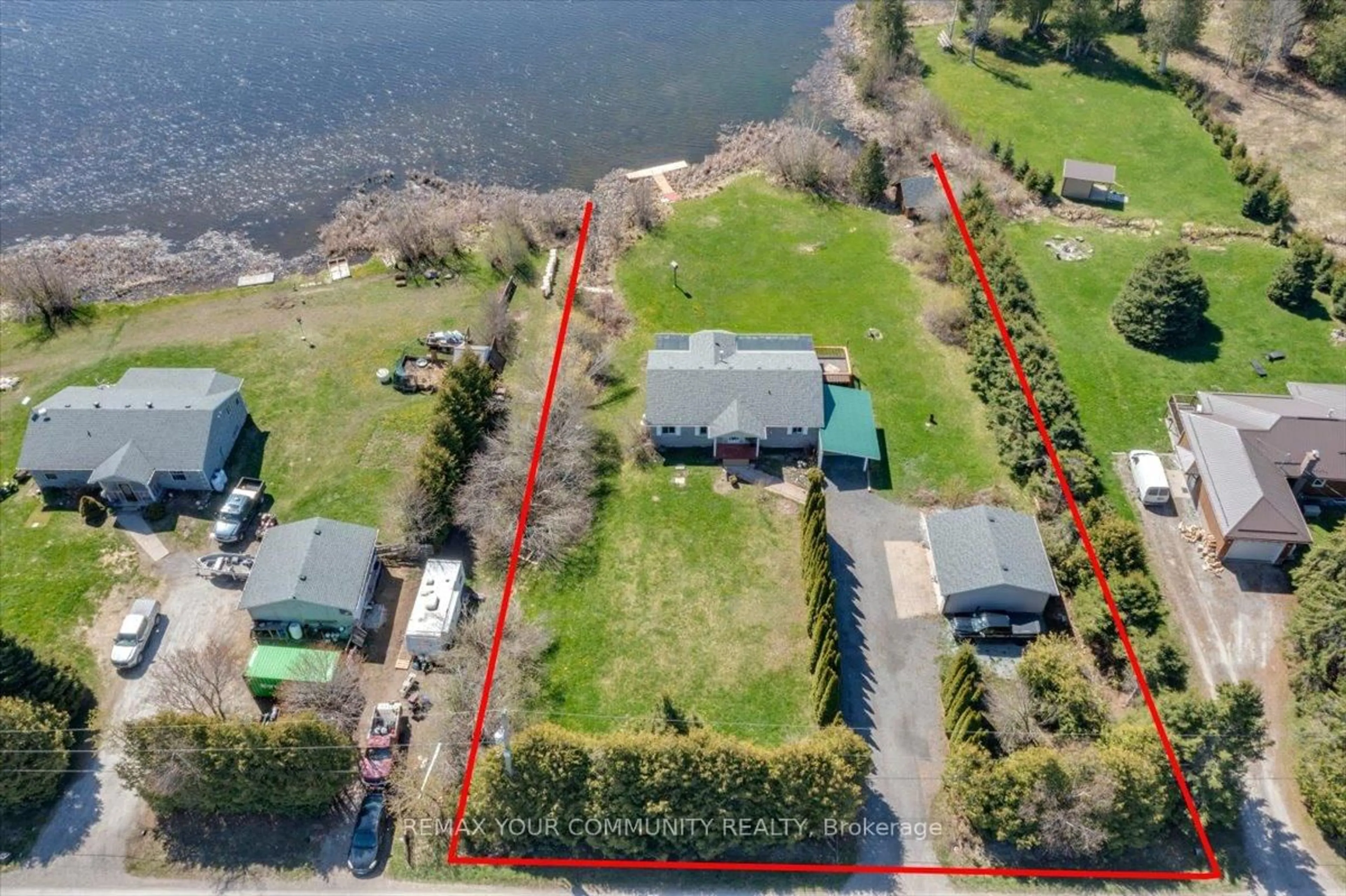 A pic from outside/outdoor area/front of a property/back of a property/a pic from drone, water/lake/river/ocean view for 586 Rohallion Rd, Kawartha Lakes Ontario L0K 1B0