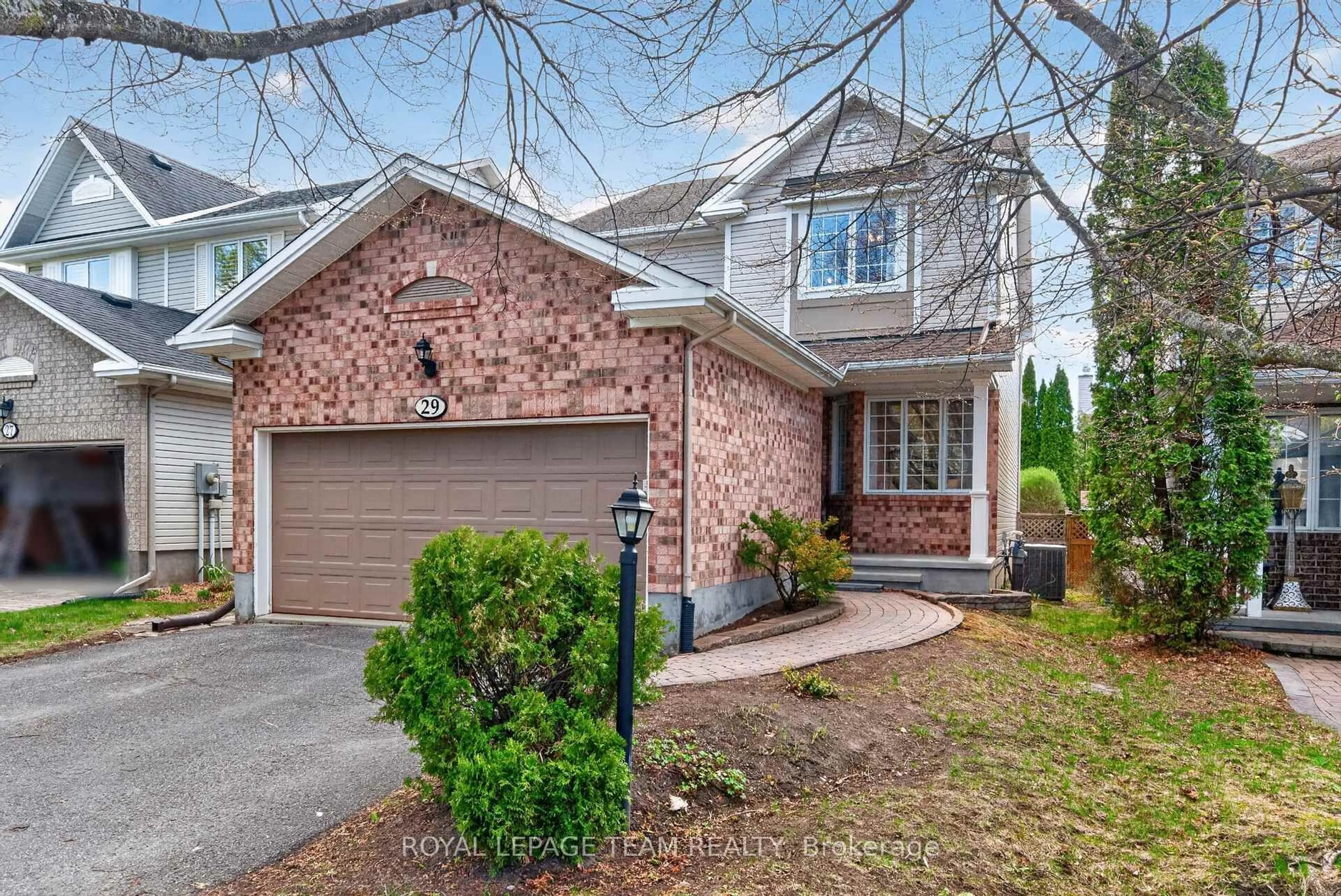 Home with brick exterior material, street for 29 Mattawa Cres, Ottawa Ontario K2M 2E8