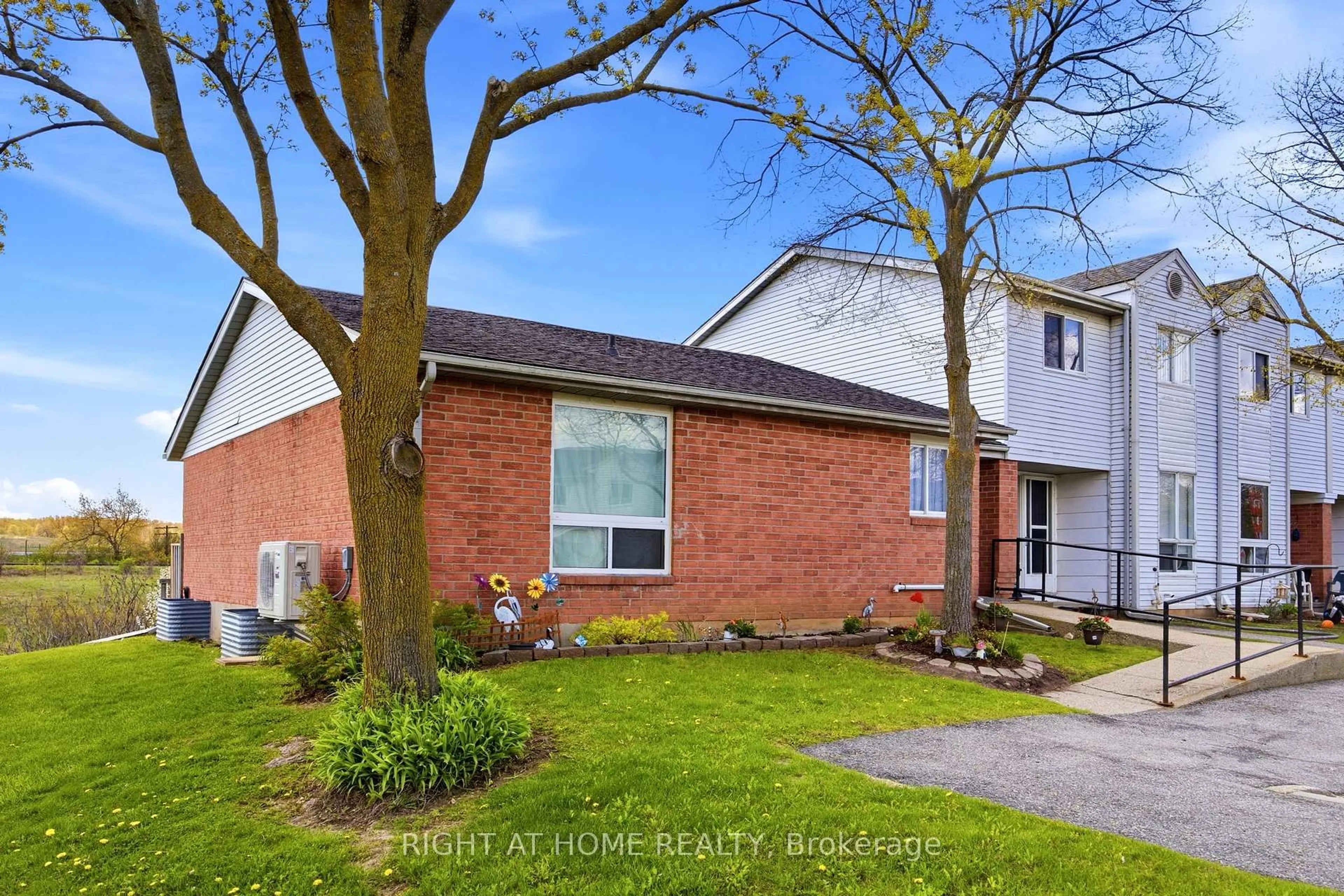 Home with brick exterior material, street for 40 Imperial Rd #20, Guelph Ontario N1H 8B4