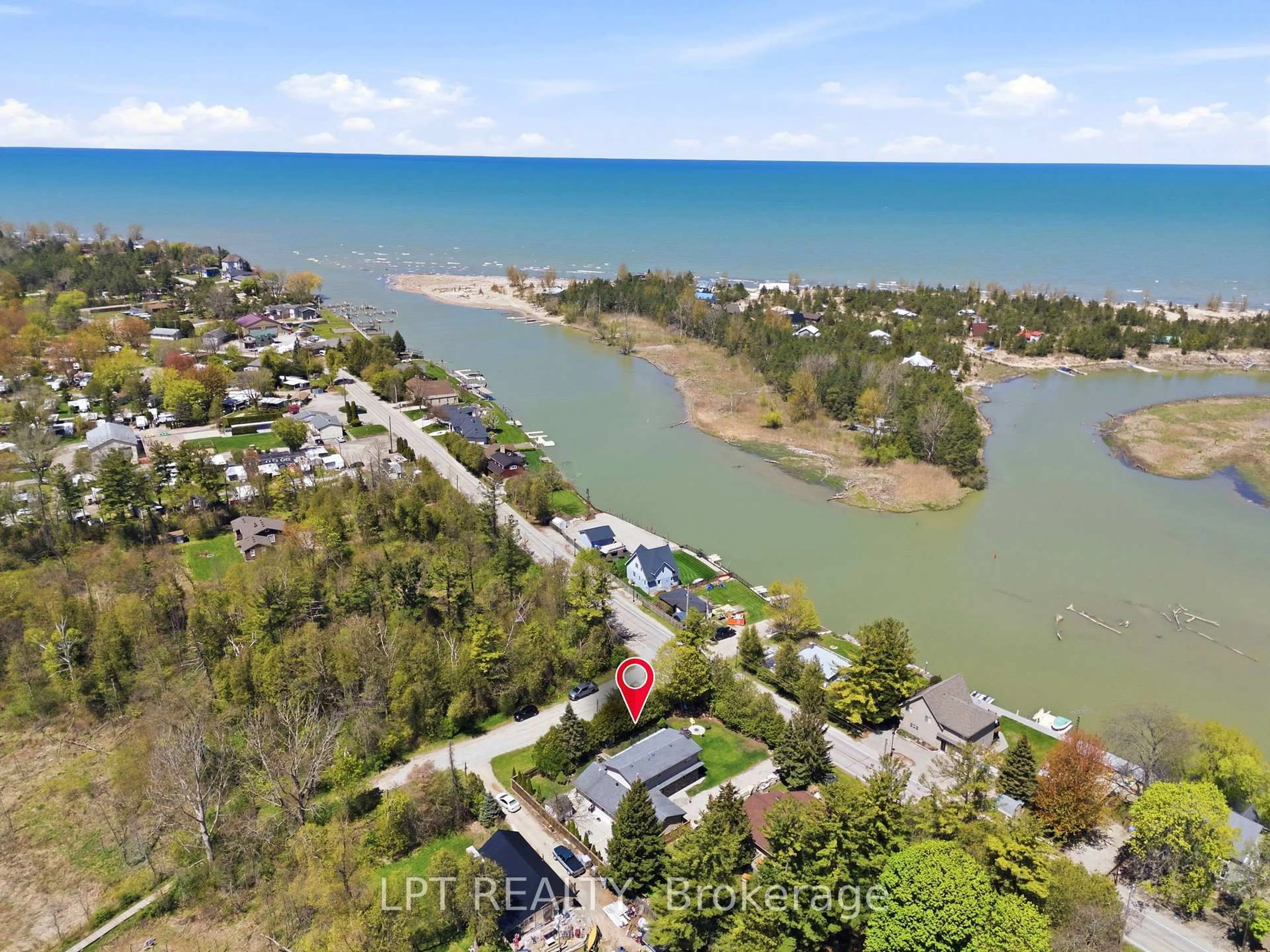A pic from outside/outdoor area/front of a property/back of a property/a pic from drone, water/lake/river/ocean view for 9996 Huron St, Lambton Shores Ontario N0M 2L0