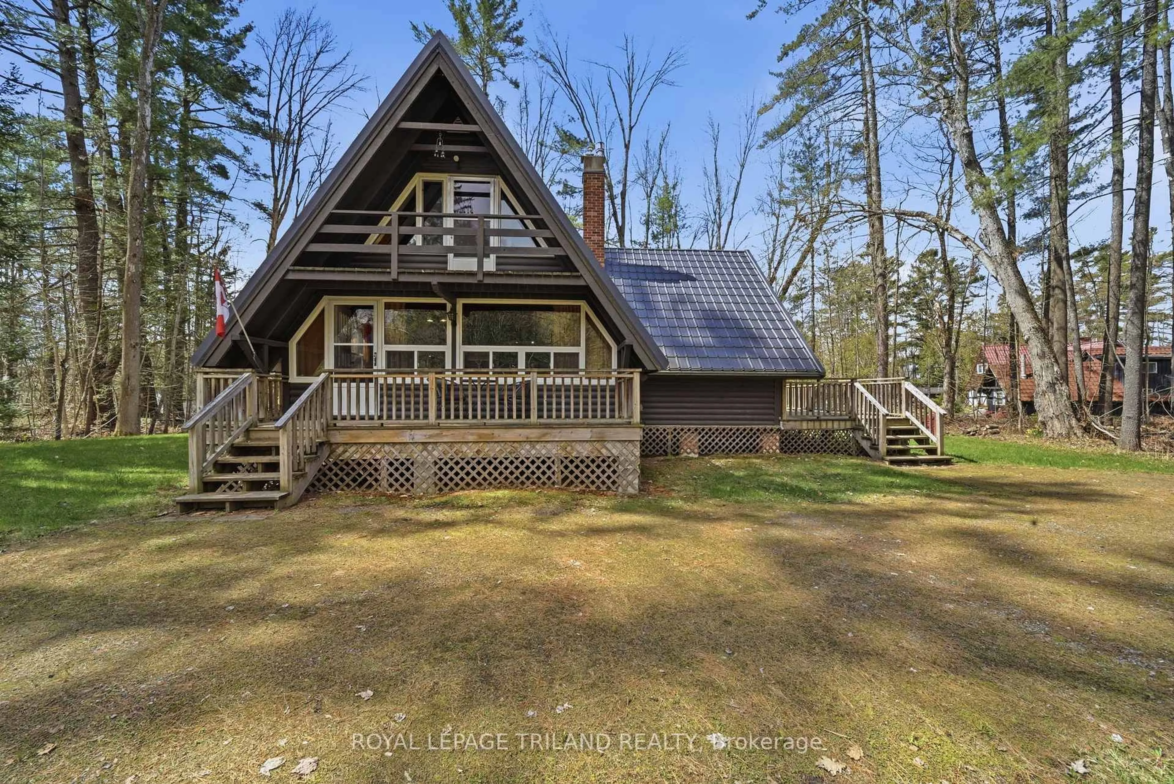 A pic from outside/outdoor area/front of a property/back of a property/a pic from drone, water/lake/river/ocean view for 1003 Chippewa Lane, Gravenhurst Ontario P1P 1R1