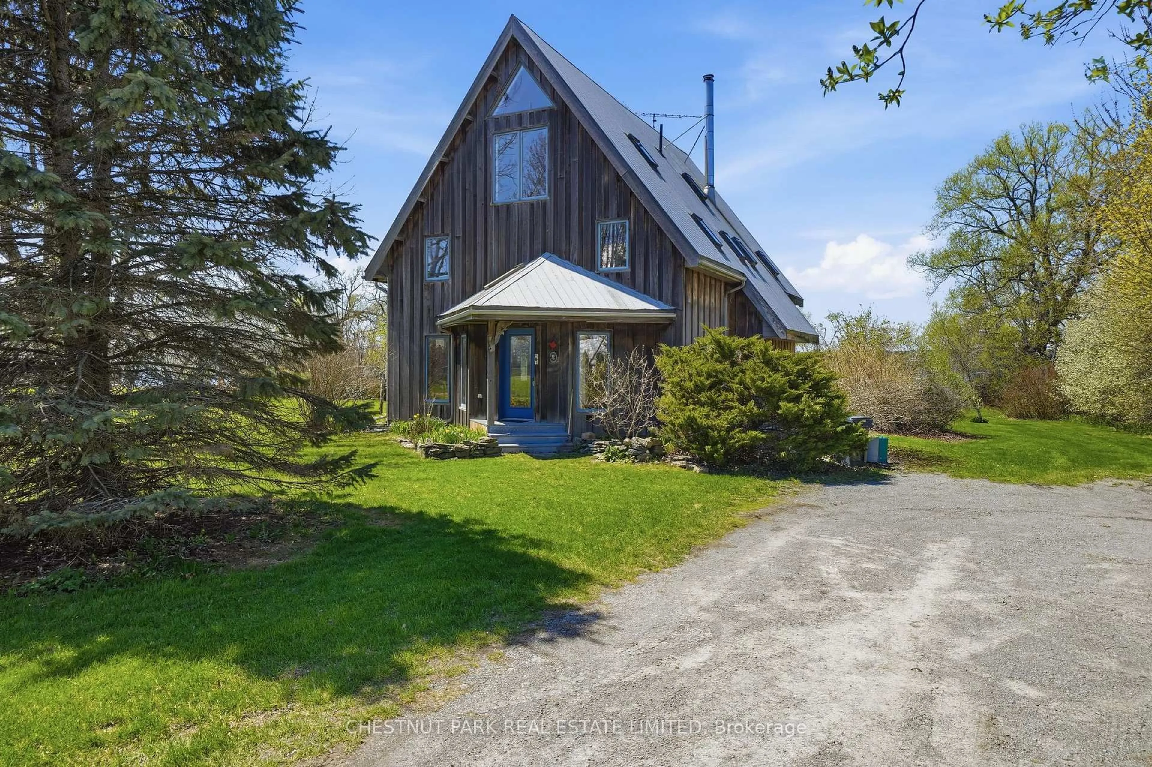 A pic from outside/outdoor area/front of a property/back of a property/a pic from drone, street for 3071 County Road 13, Prince Edward County Ontario K0K 2T0