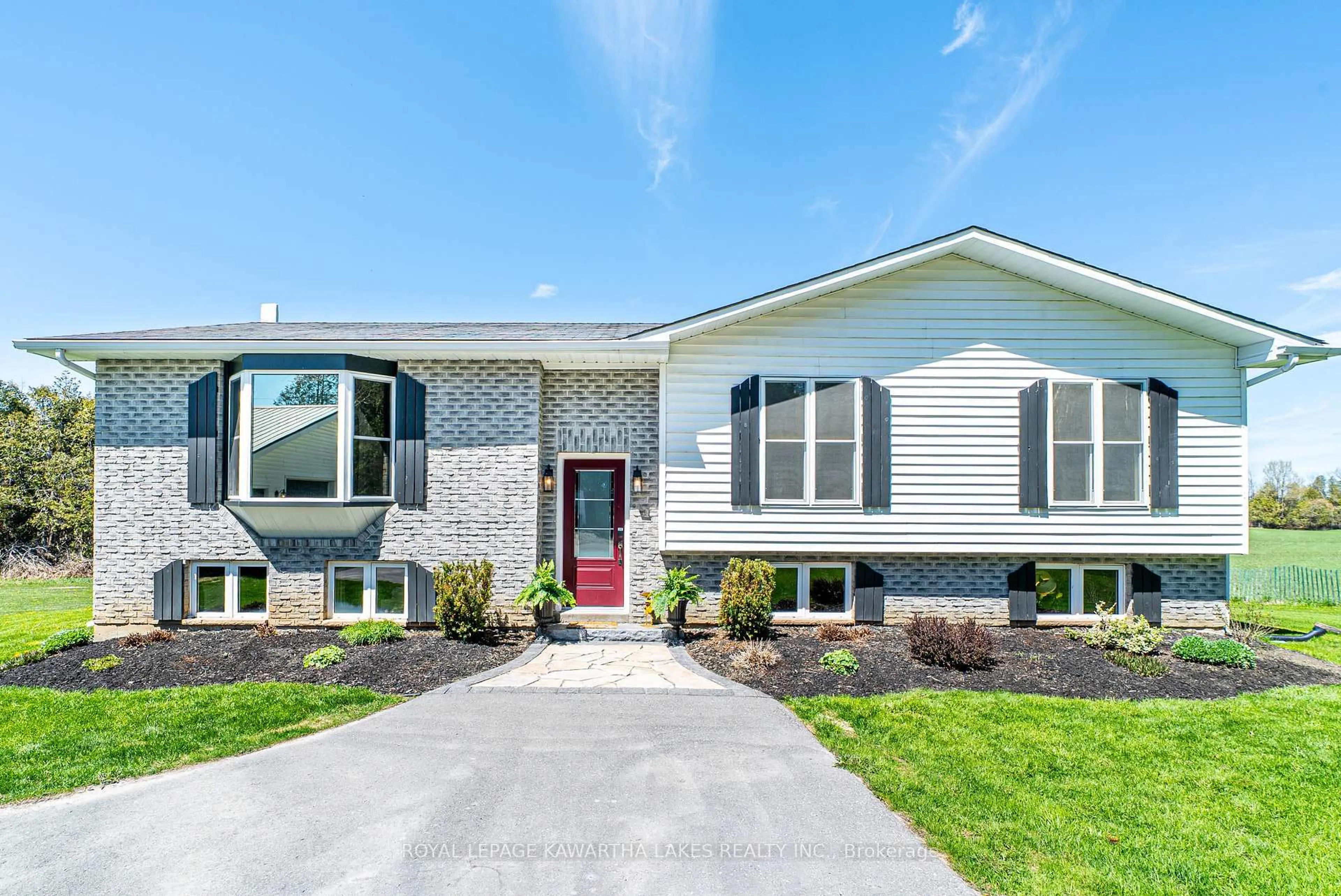 Home with vinyl exterior material, street for 75 Prescott Rd, Kawartha Lakes Ontario K0M 1A0