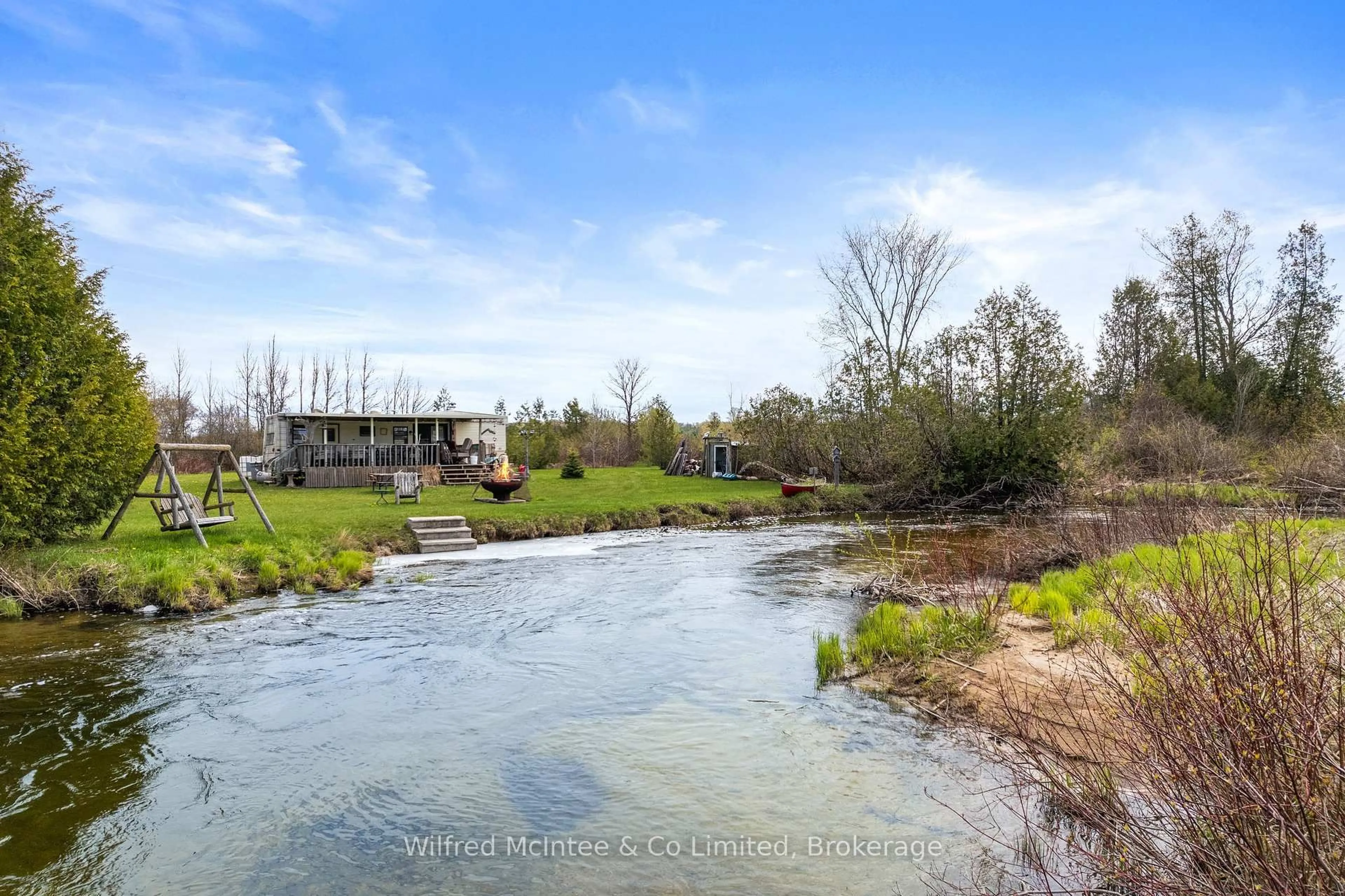 A pic from outside/outdoor area/front of a property/back of a property/a pic from drone, water/lake/river/ocean view for 341727 Concession Rd 2 NDR, West Grey Ontario N4N 3B9
