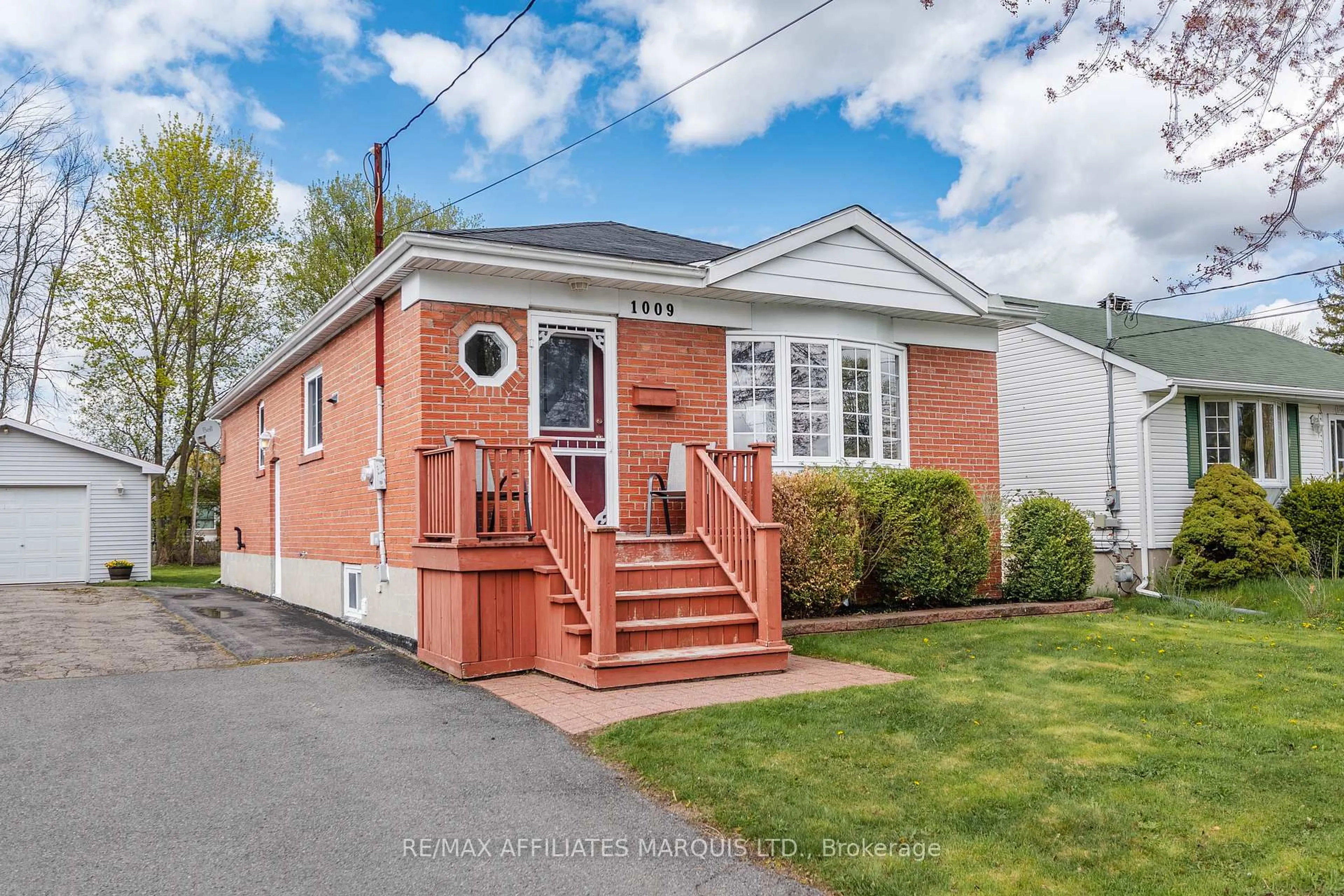 Home with brick exterior material, street for 1009 Leonard Ave, Cornwall Ontario K6J 1M1