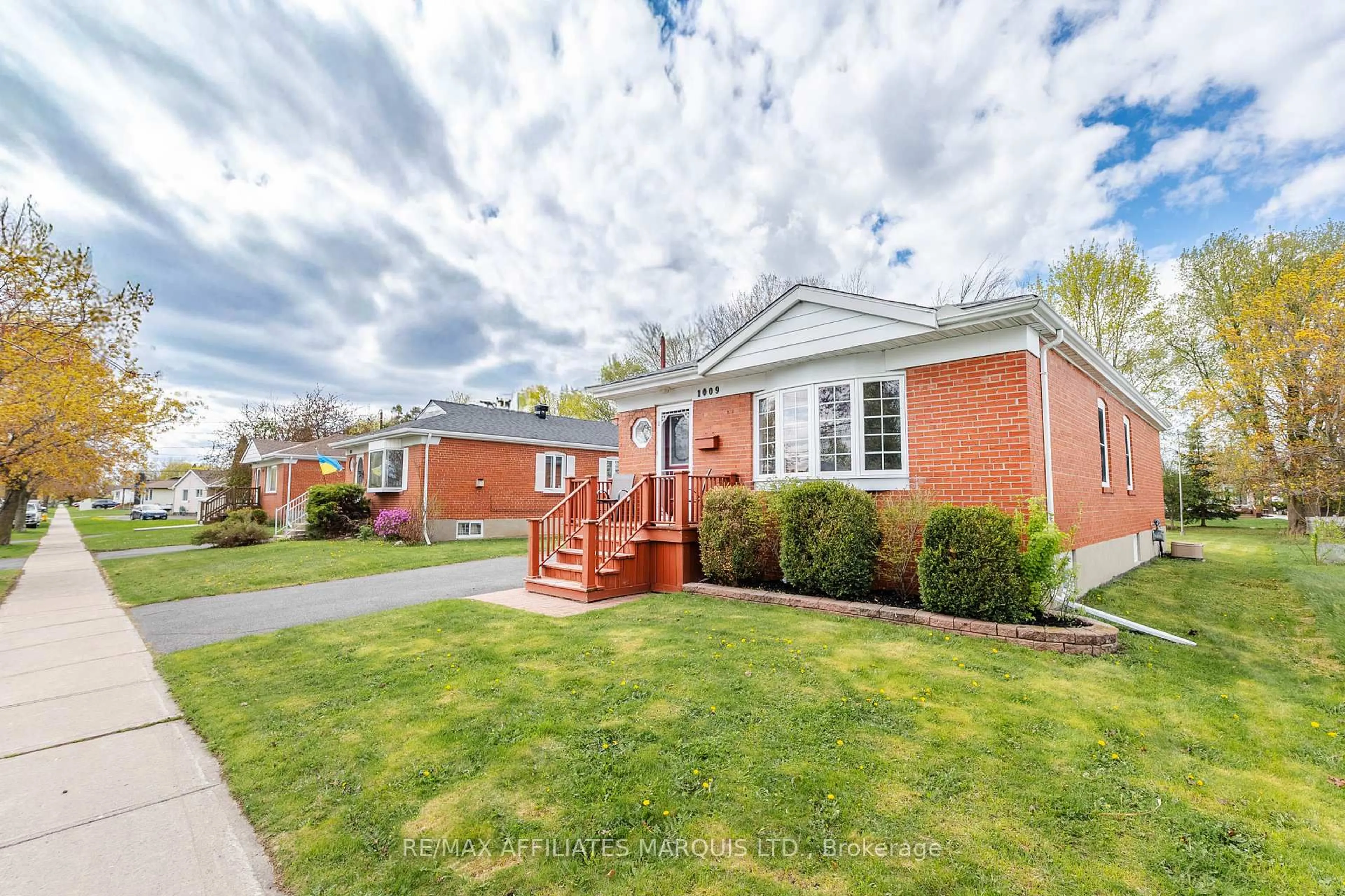 Home with brick exterior material, street for 1009 Leonard Ave, Cornwall Ontario K6J 1M1