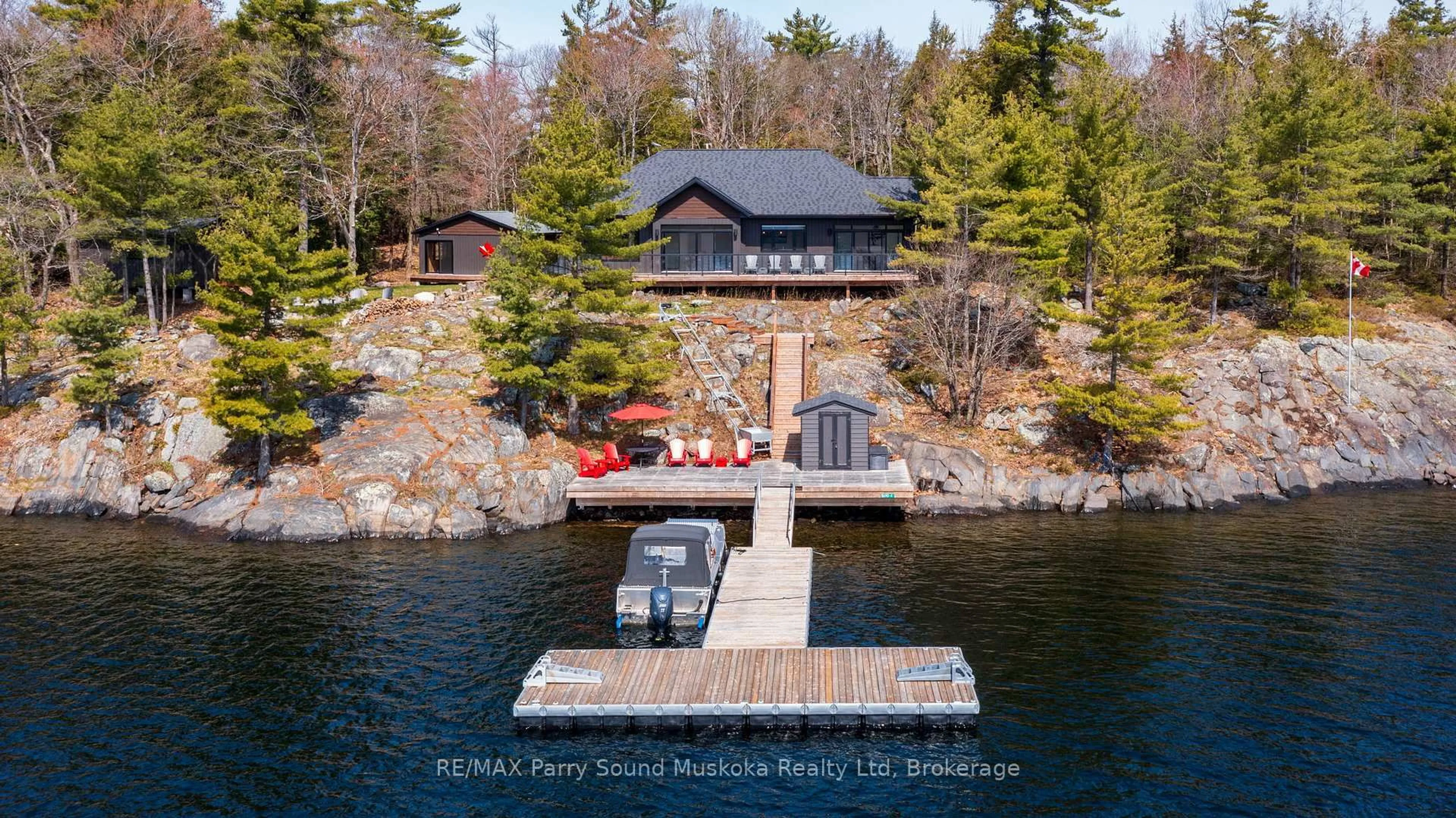 A pic from outside/outdoor area/front of a property/back of a property/a pic from drone, water/lake/river/ocean view for 4 B690 Island, The Archipelago Ontario P2A 2W9