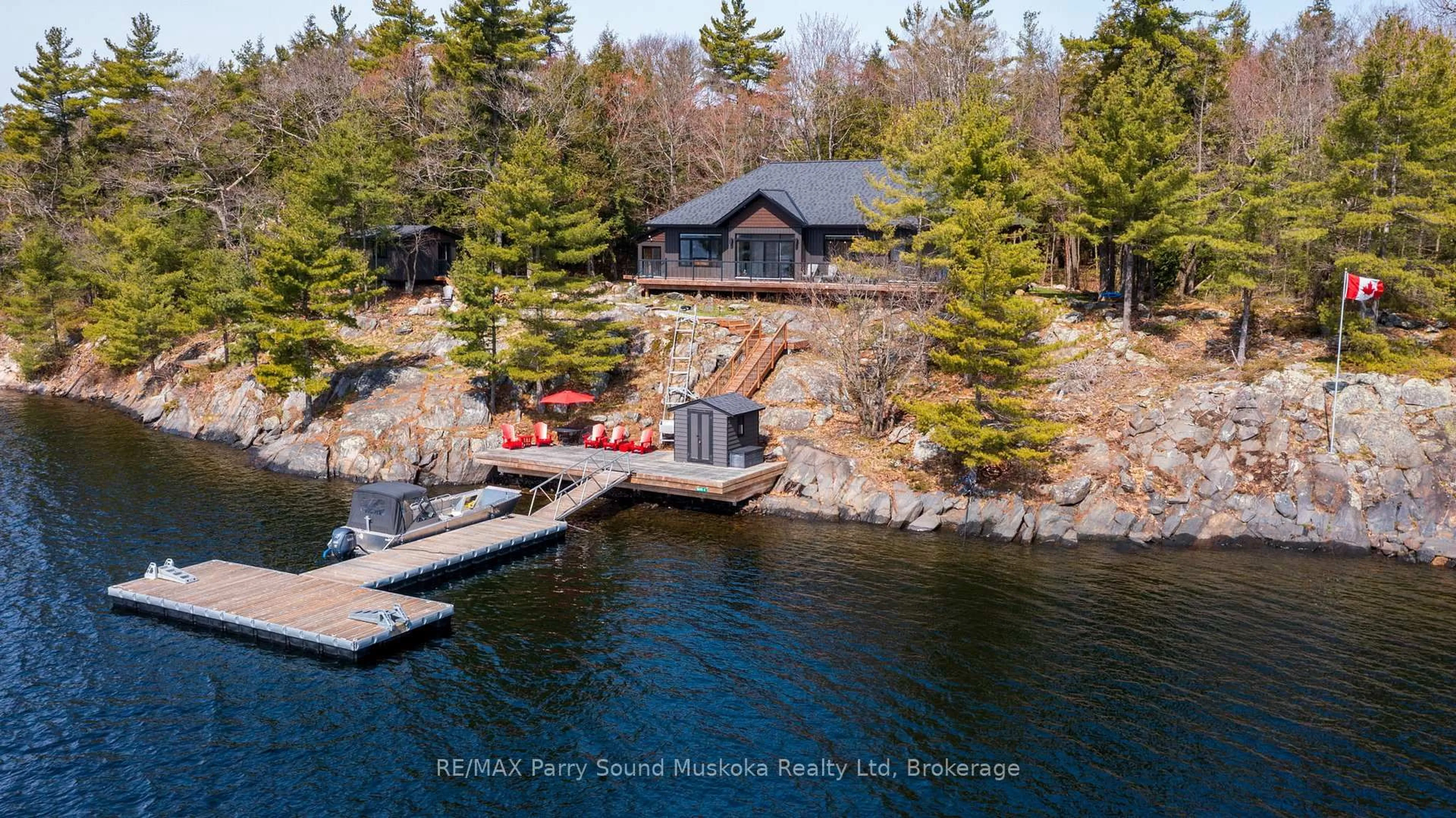 A pic from outside/outdoor area/front of a property/back of a property/a pic from drone, water/lake/river/ocean view for 4 B690 Island, The Archipelago Ontario P2A 2W9