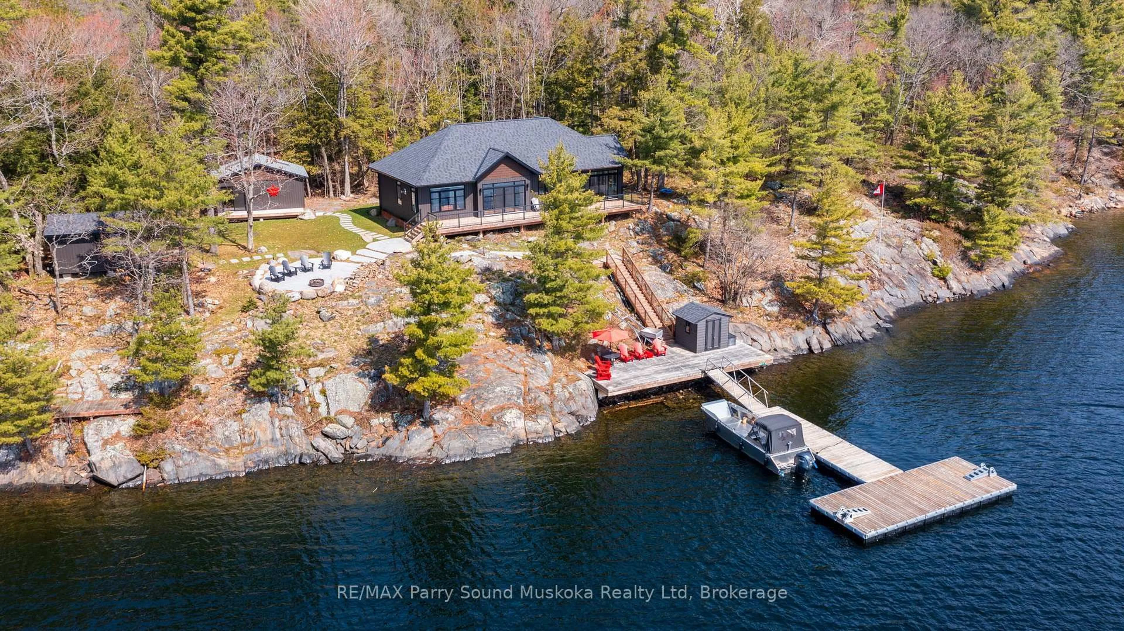 A pic from outside/outdoor area/front of a property/back of a property/a pic from drone, water/lake/river/ocean view for 4 B690 Island, The Archipelago Ontario P2A 2W9