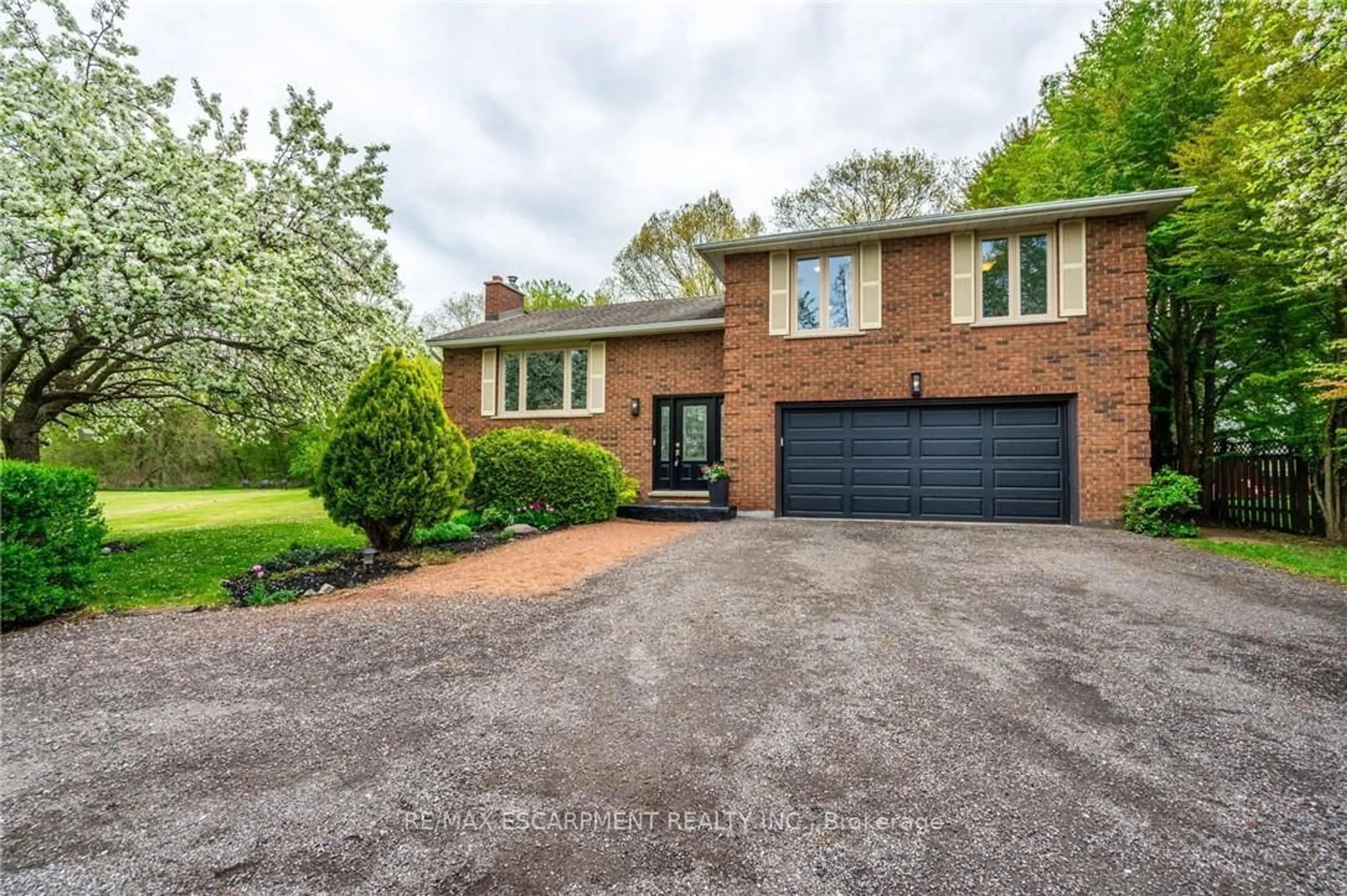 Home with brick exterior material, street for 152 7th Concession Rd, Hamilton Ontario L0R 1V0