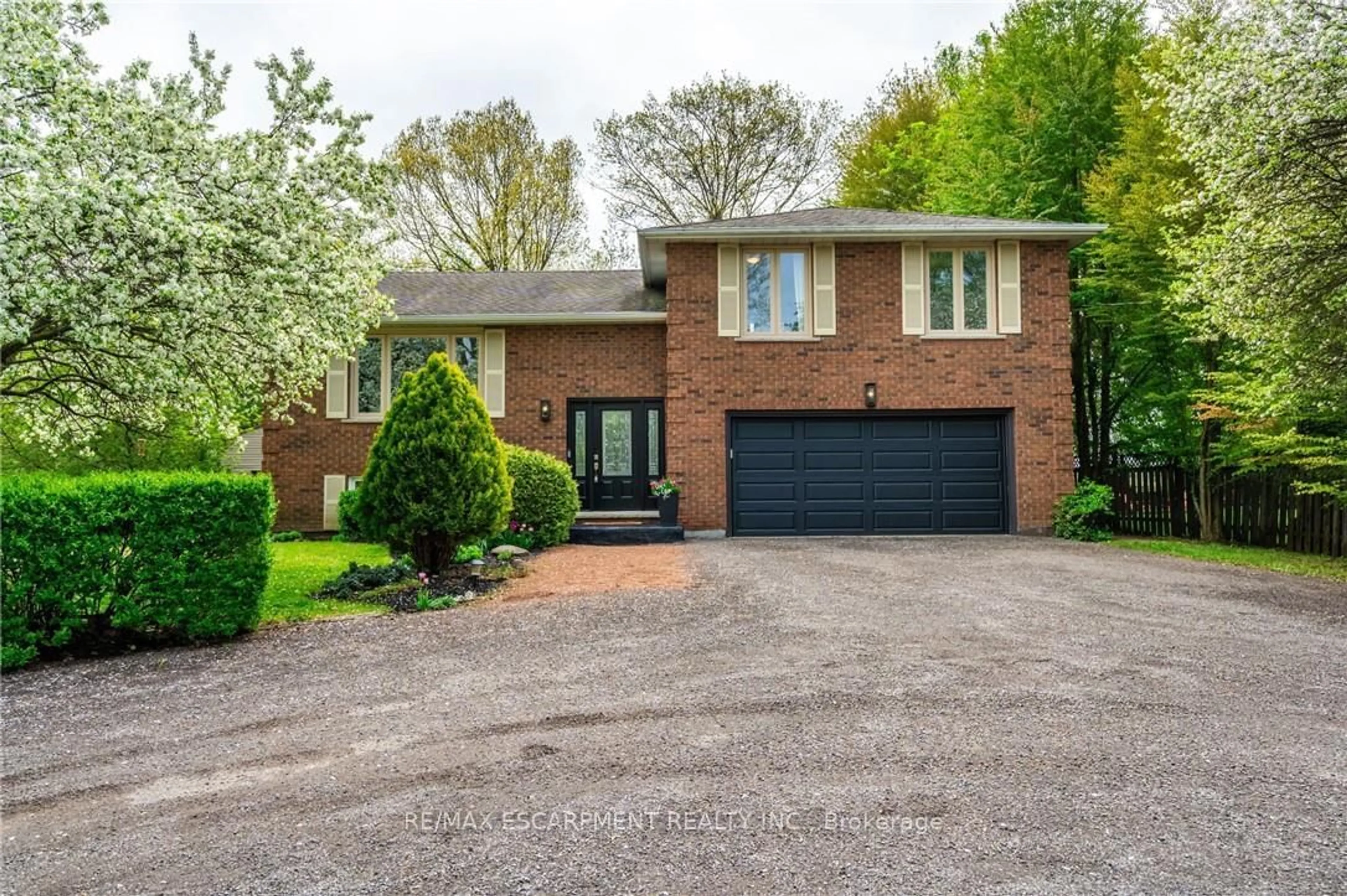 Home with brick exterior material, street for 152 7th Concession Rd, Hamilton Ontario L0R 1V0