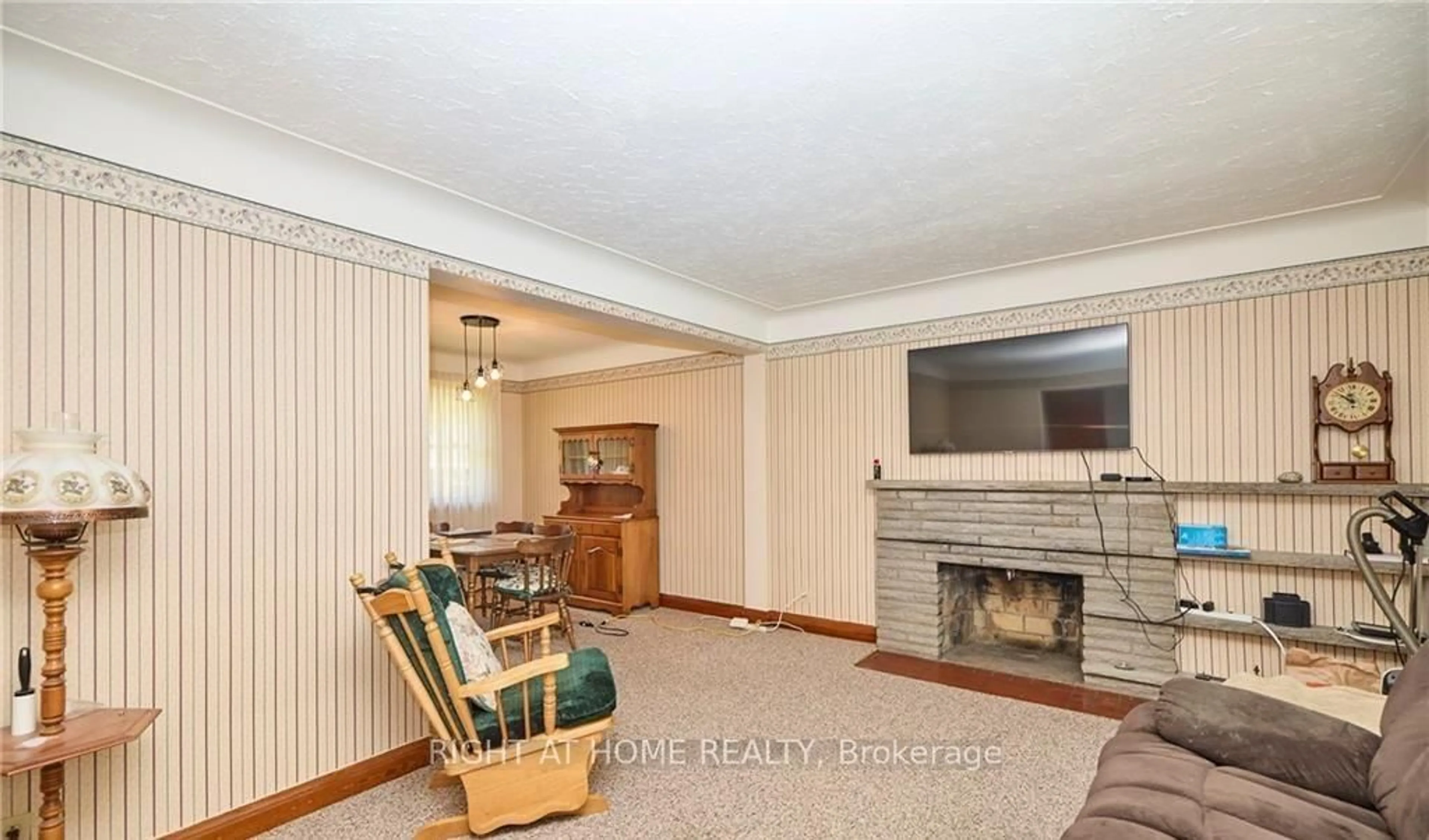 Living room with furniture, unknown for 6357 Dorchester Rd, Niagara Falls Ontario L2G 5T4